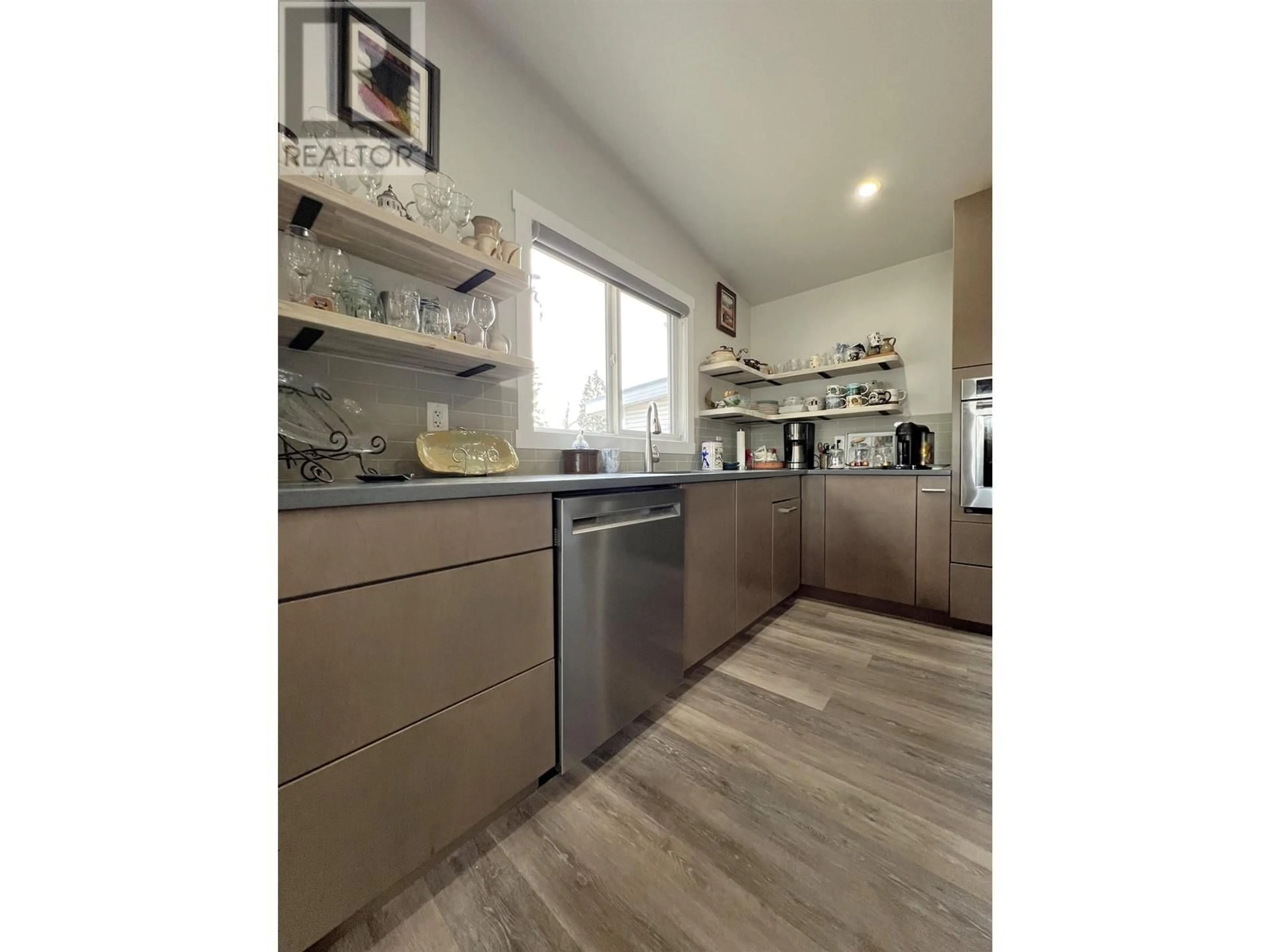 Contemporary kitchen, wood/laminate floor for 305 KELLY STREET, Prince George British Columbia V2M3K4