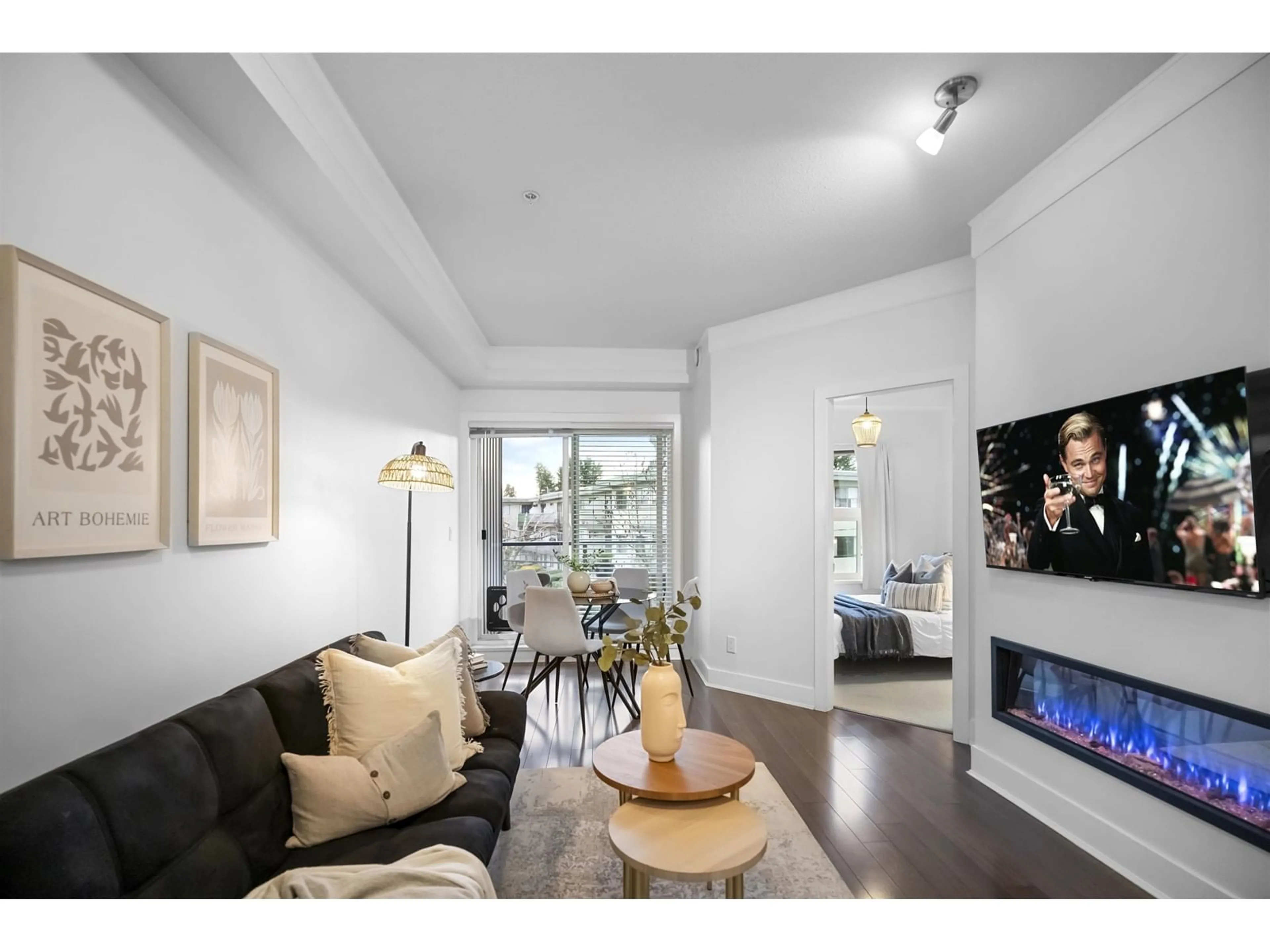 Living room with furniture, wood/laminate floor for 206 - 20630 DOUGLAS, Langley British Columbia V3A4B8
