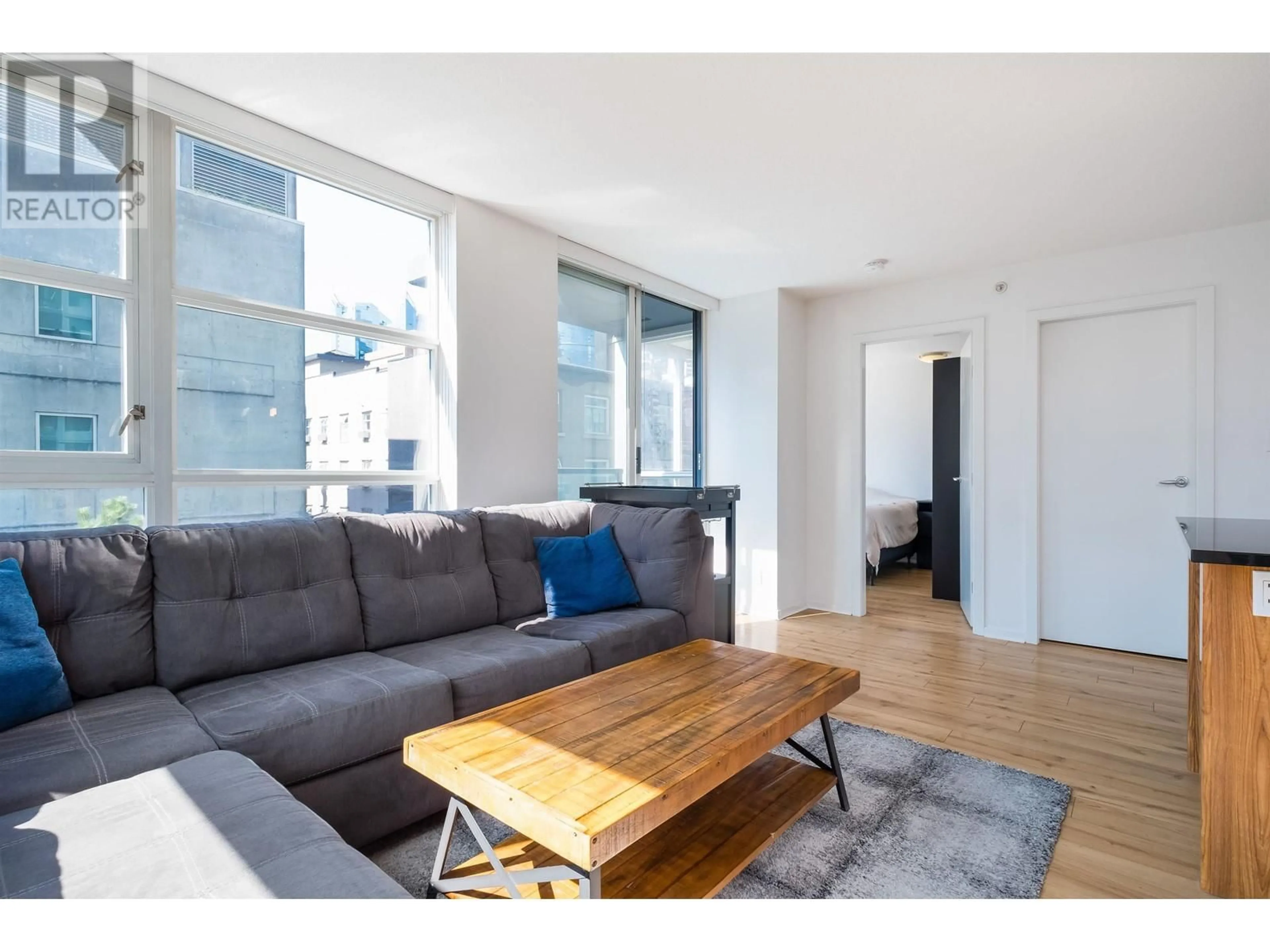 Living room with furniture, wood/laminate floor for 608 - 1199 SEYMOUR STREET, Vancouver British Columbia V6B1K3