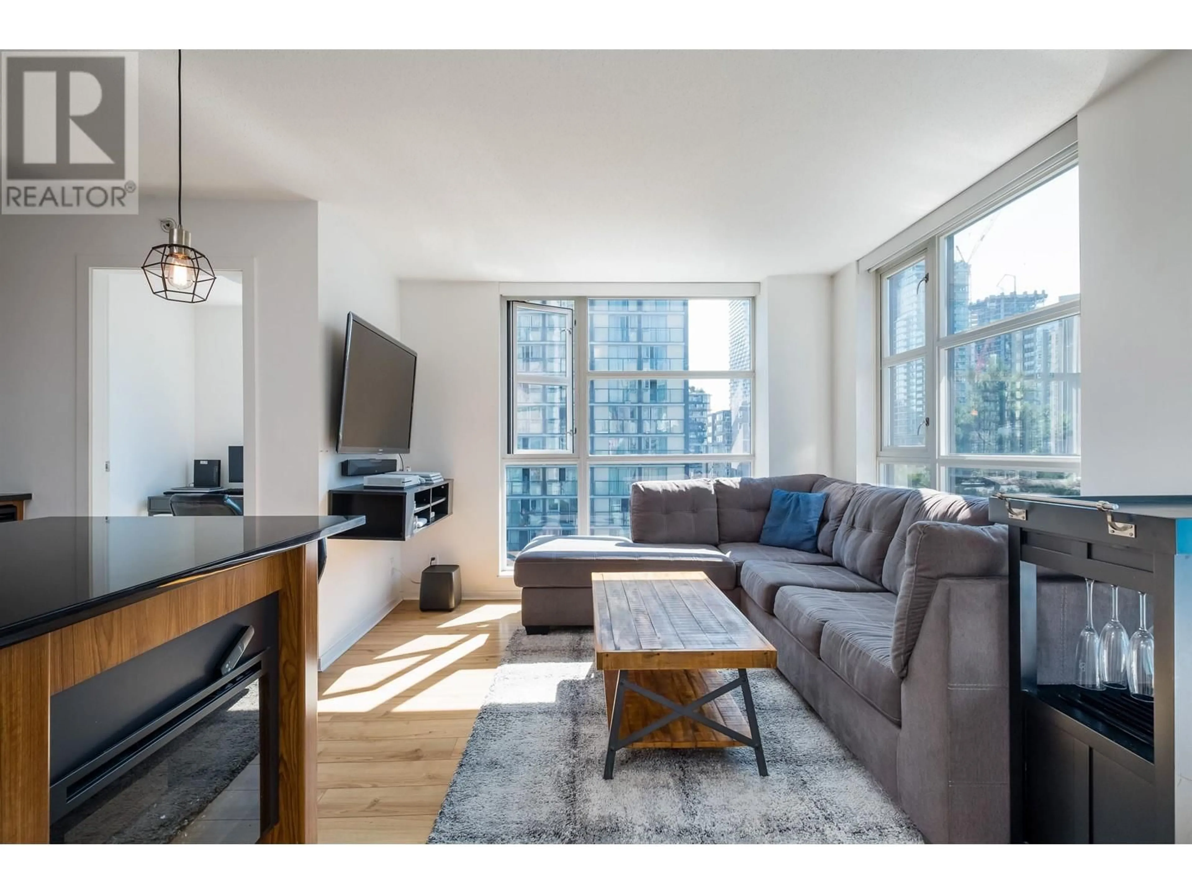 Living room with furniture, wood/laminate floor for 608 - 1199 SEYMOUR STREET, Vancouver British Columbia V6B1K3