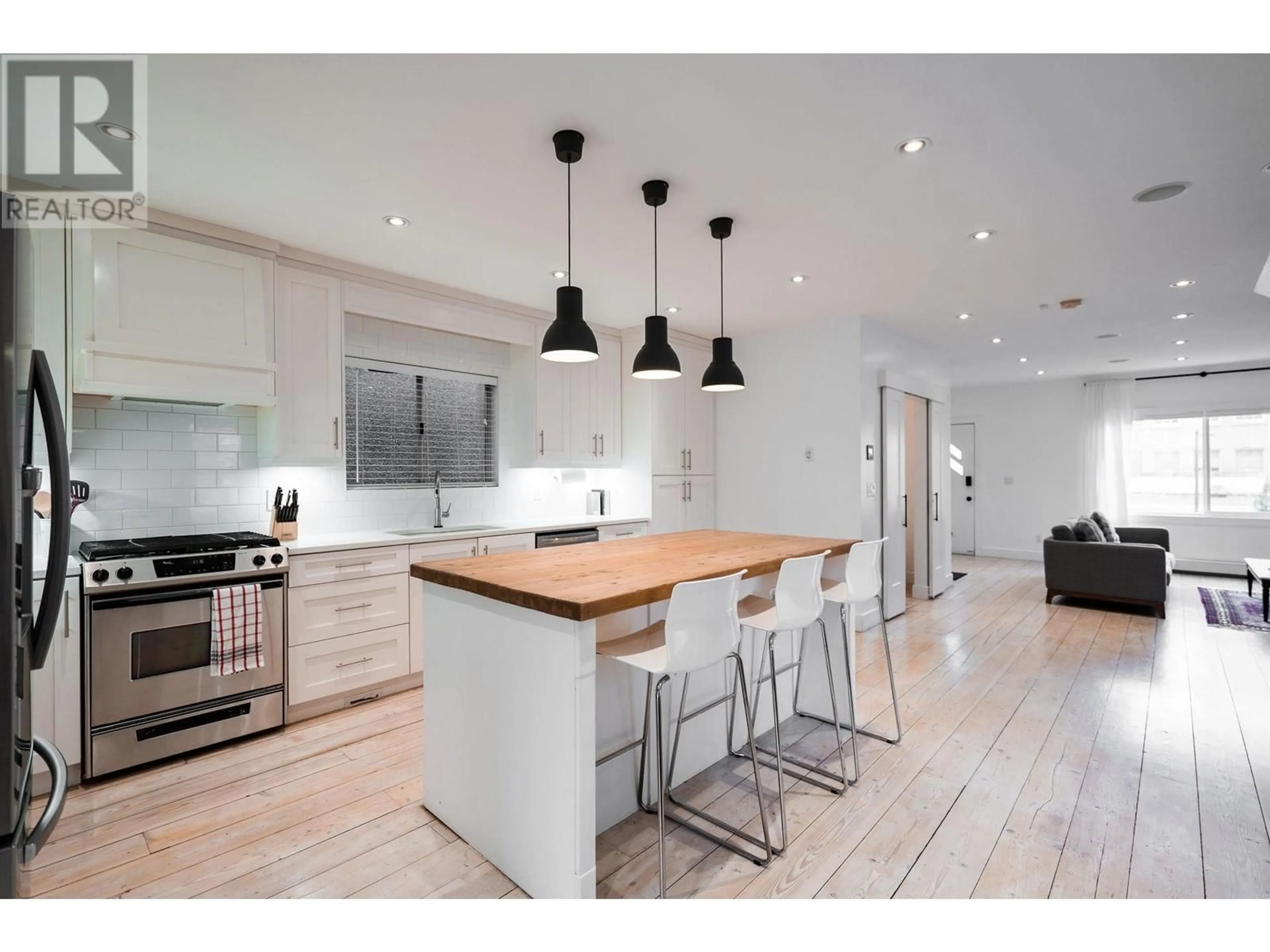 Contemporary kitchen, wood/laminate floor for 1121 KEEFER STREET, Vancouver British Columbia V6A1Z2