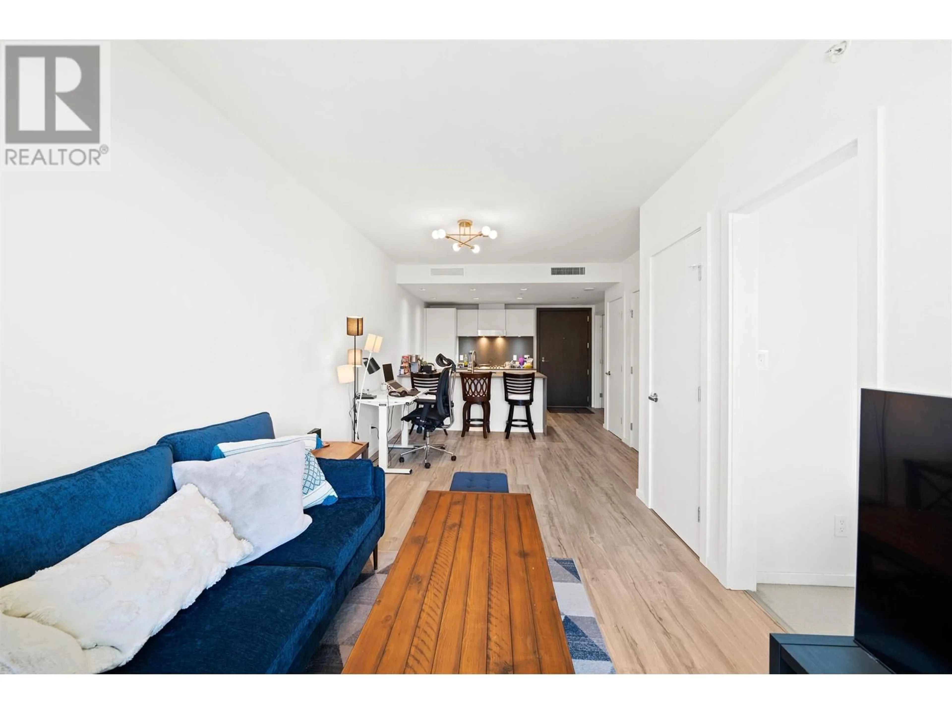 Living room with furniture, wood/laminate floor for 903 - 8588 CORNISH STREET, Vancouver British Columbia V6P0C1