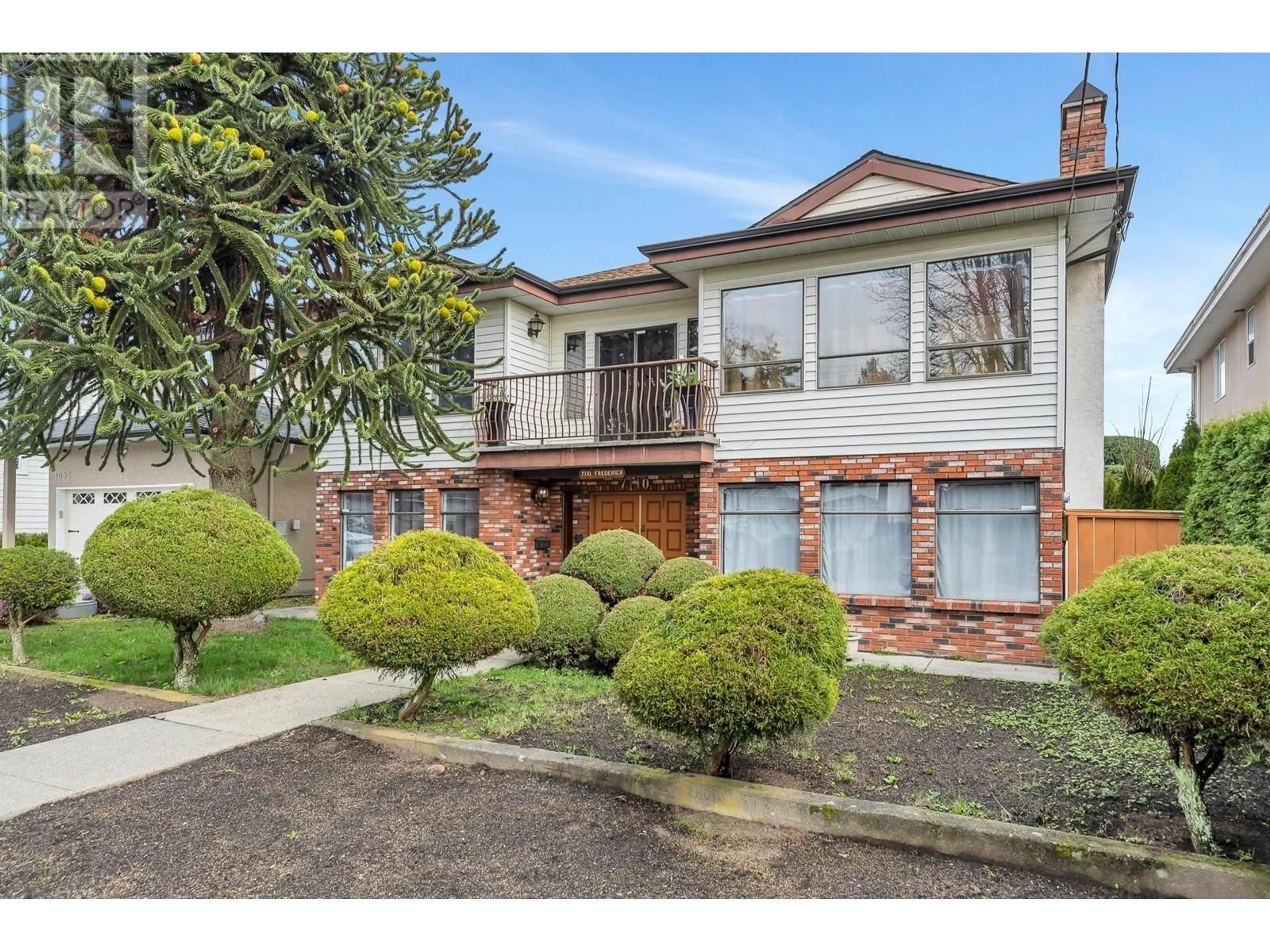 Home with brick exterior material, street for 7110 FREDERICK AVENUE, Burnaby British Columbia V5J3X9