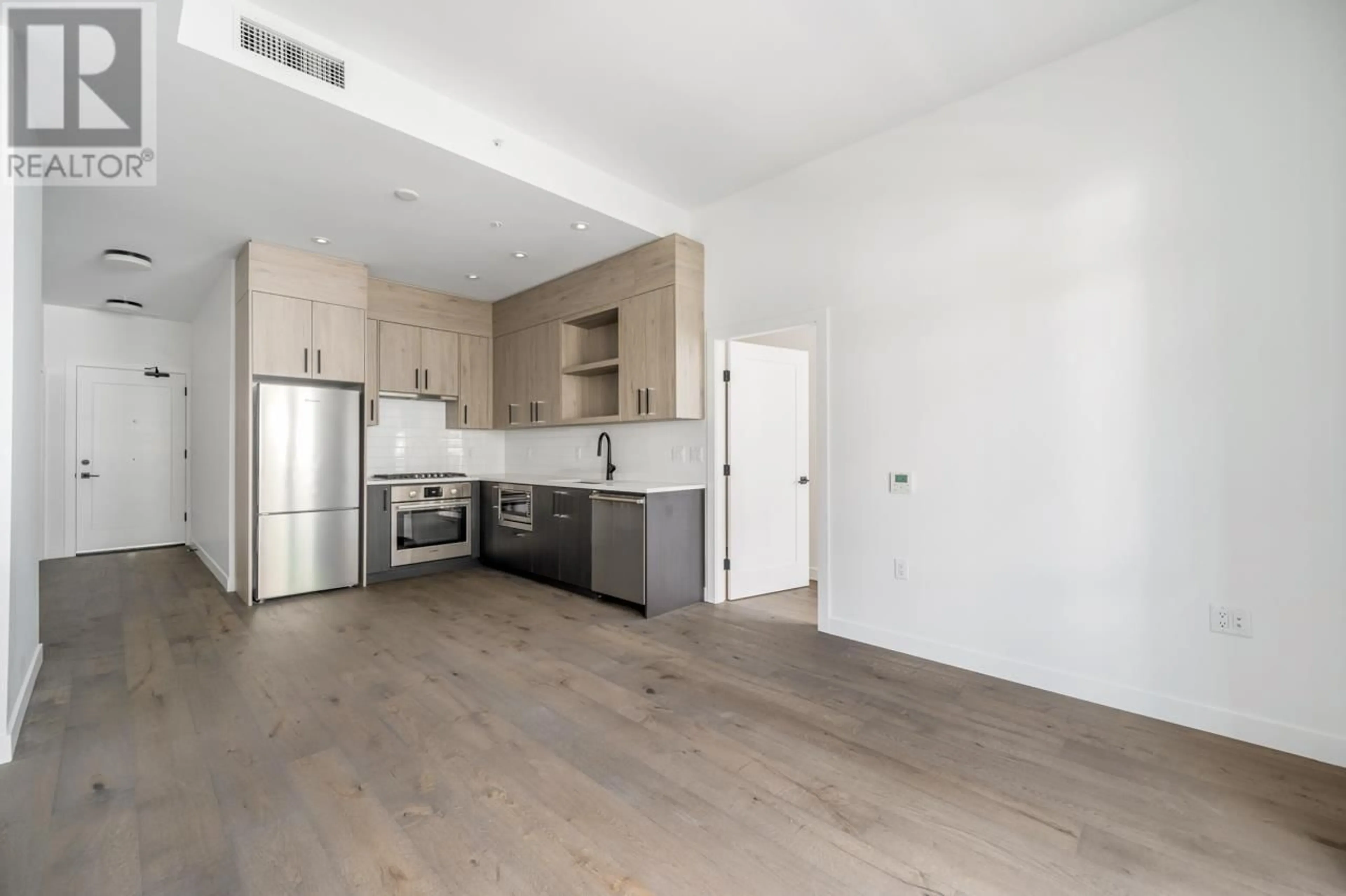 Open concept kitchen, unknown for 104 - 6859 CAMBIE STREET, Vancouver British Columbia V6P0M4