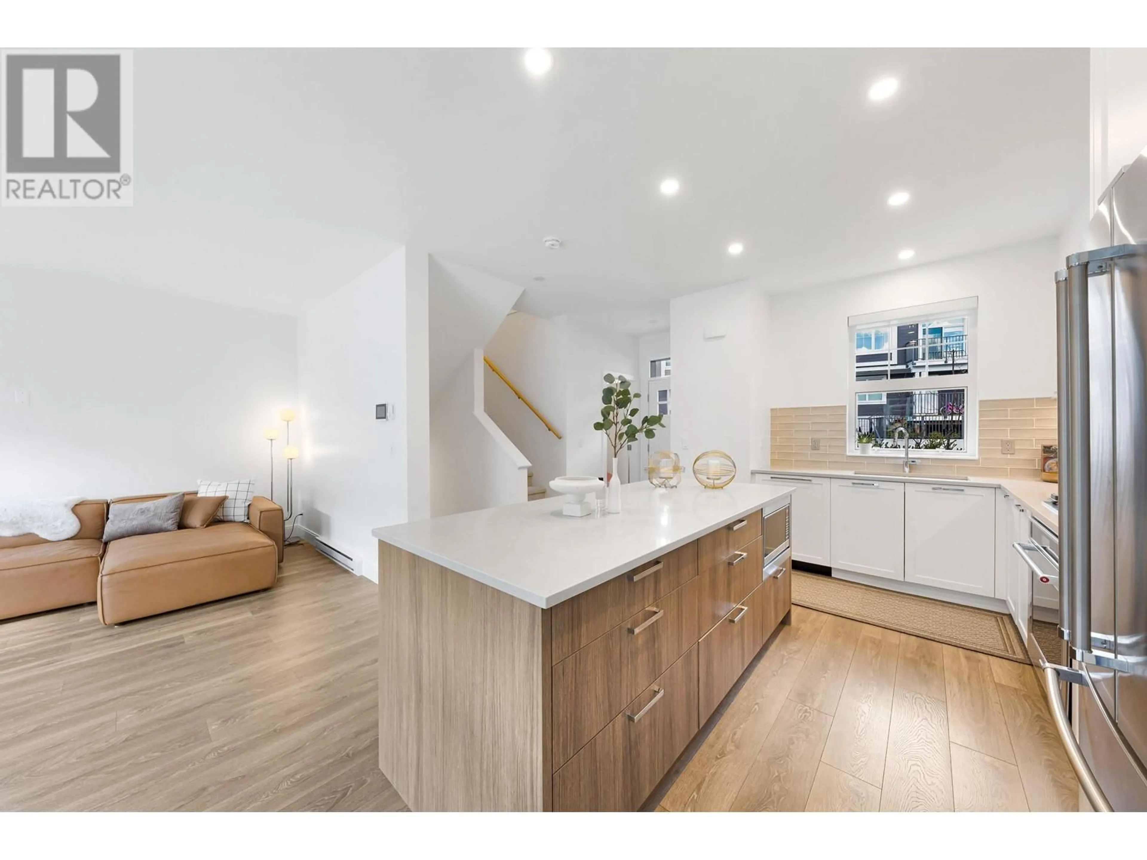 Open concept kitchen, wood/laminate floor for 103 - 1310 MITCHELL STREET, Coquitlam British Columbia V3E0T9