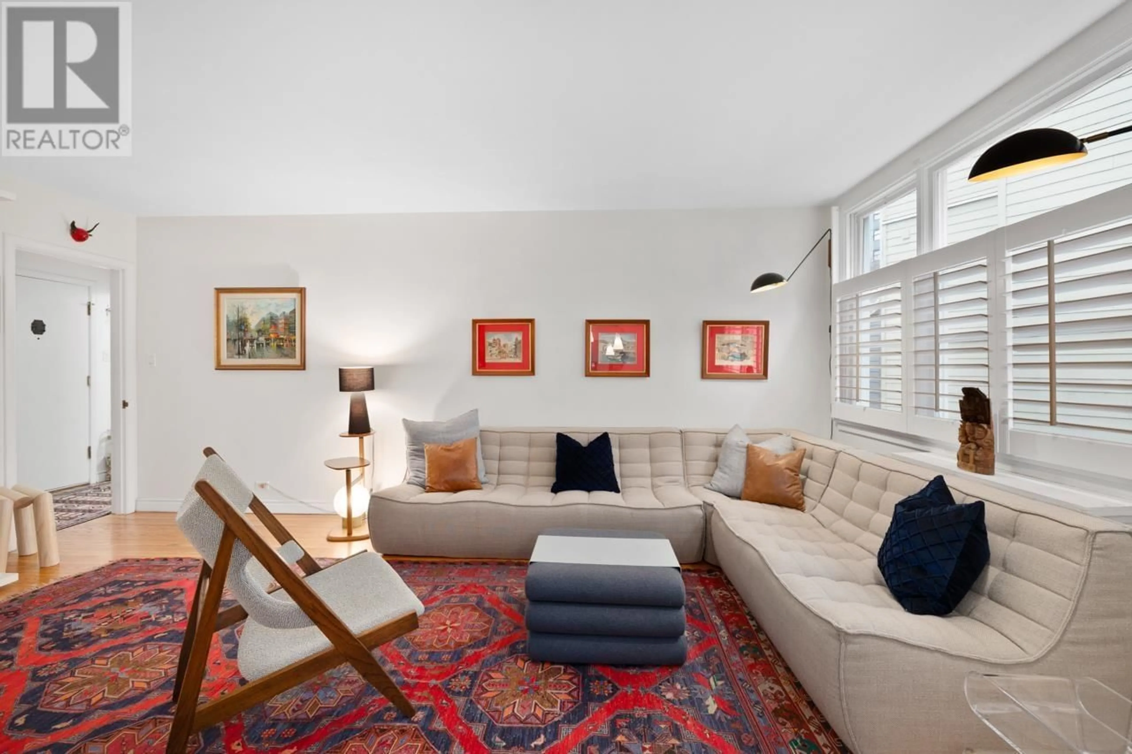 Living room with furniture, carpet floor for 204 - 1565 BURNABY STREET, Vancouver British Columbia V6G1X1