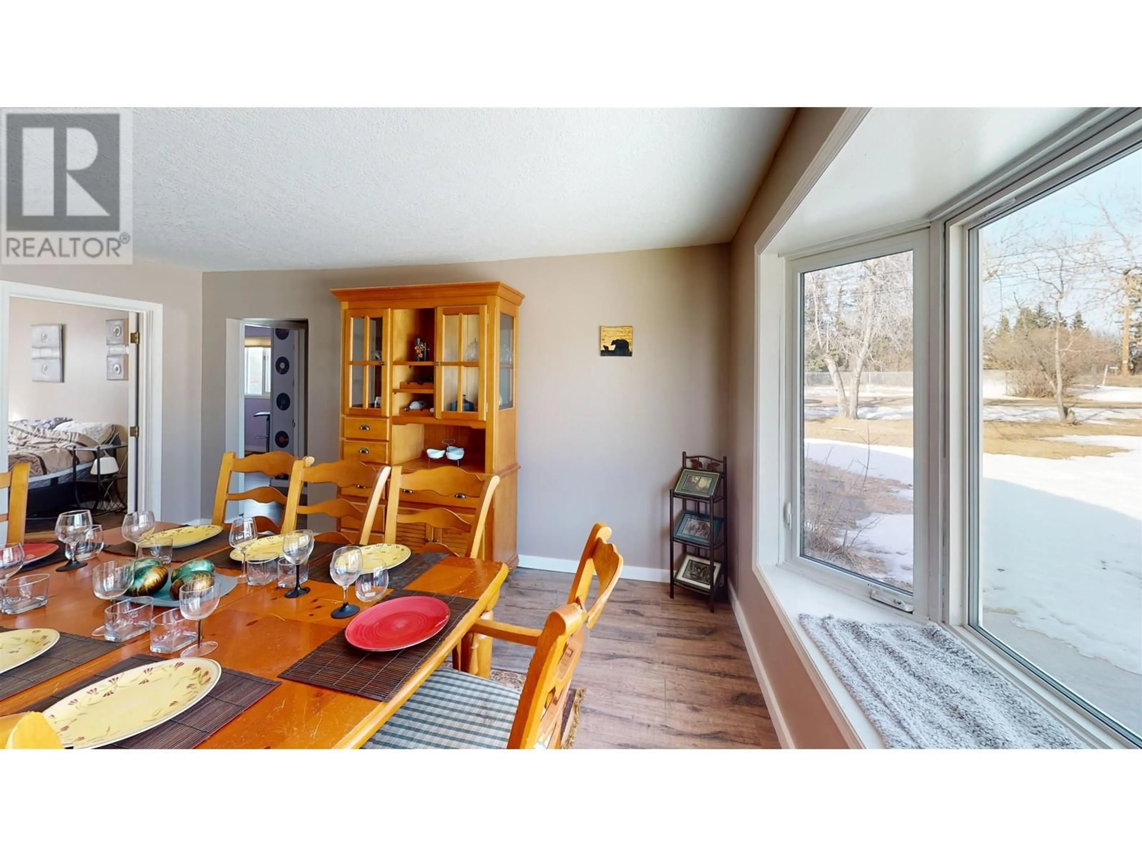 Dining room, wood/laminate floor for 12279 COTTONWOOD AVENUE, Fort St. John British Columbia V1J8B1