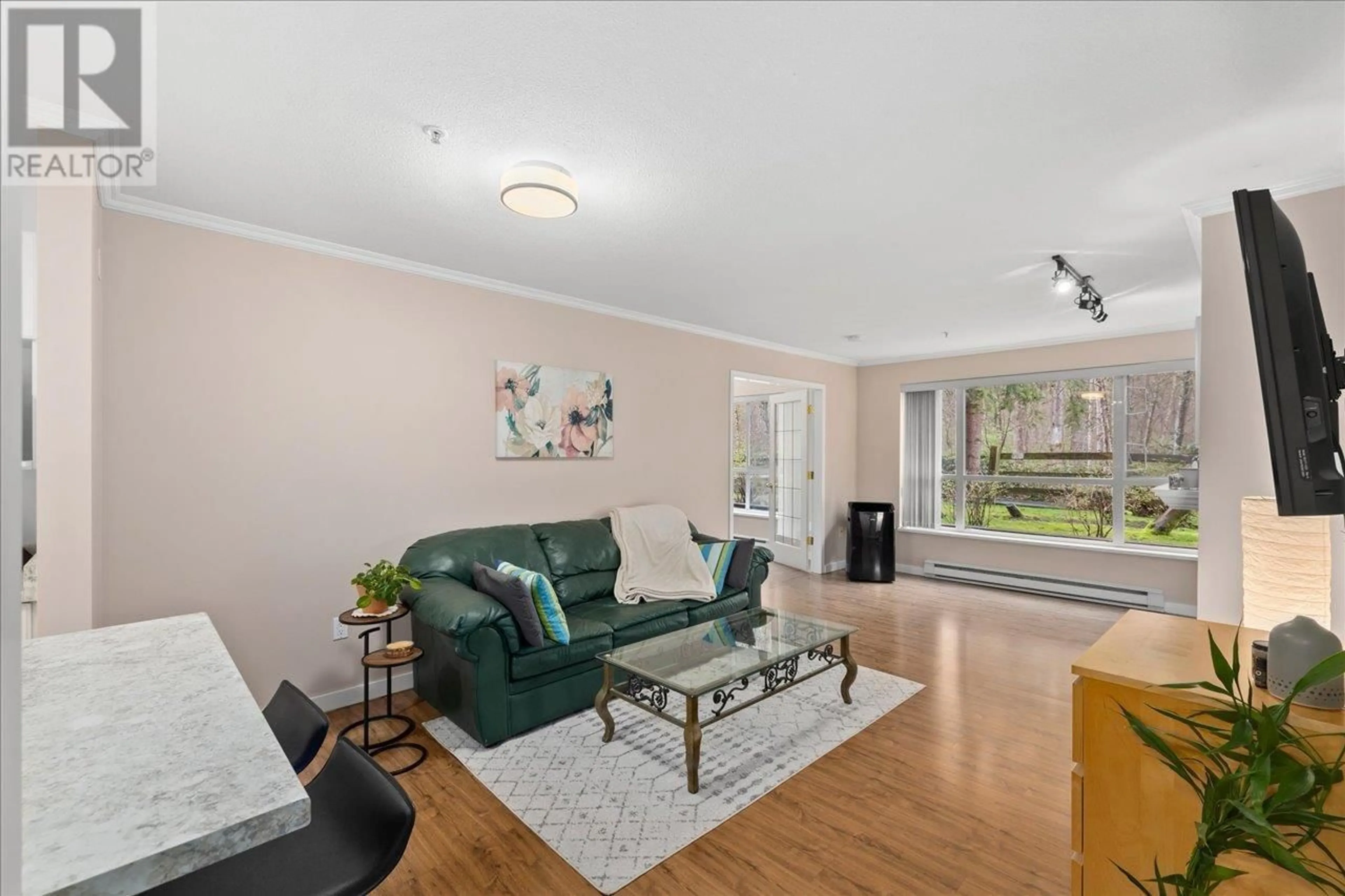 Living room with furniture, unknown for 111 - 2559 PARKVIEW LANE, Port Coquitlam British Columbia V3C6M1