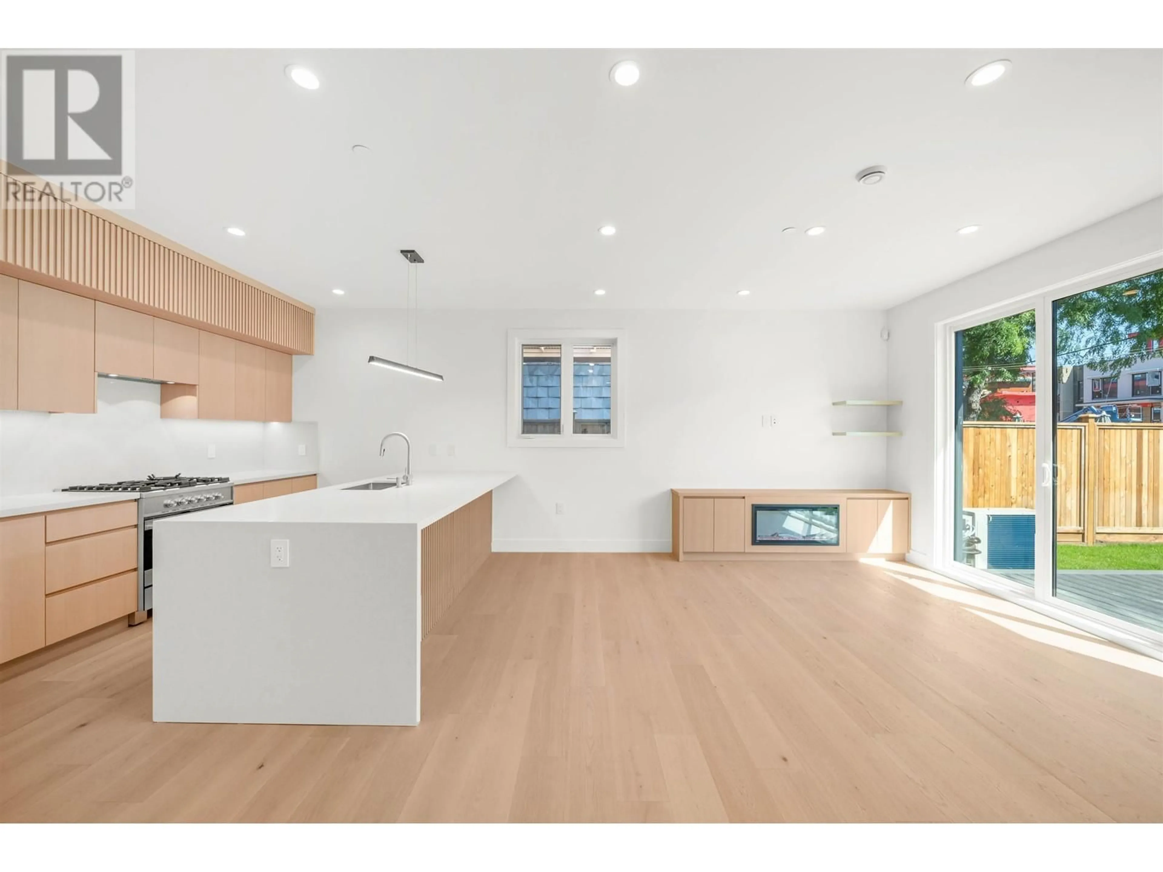 Open concept kitchen, wood/laminate floor for 2 - 760 48 AVENUE, Vancouver British Columbia V5Z2R9