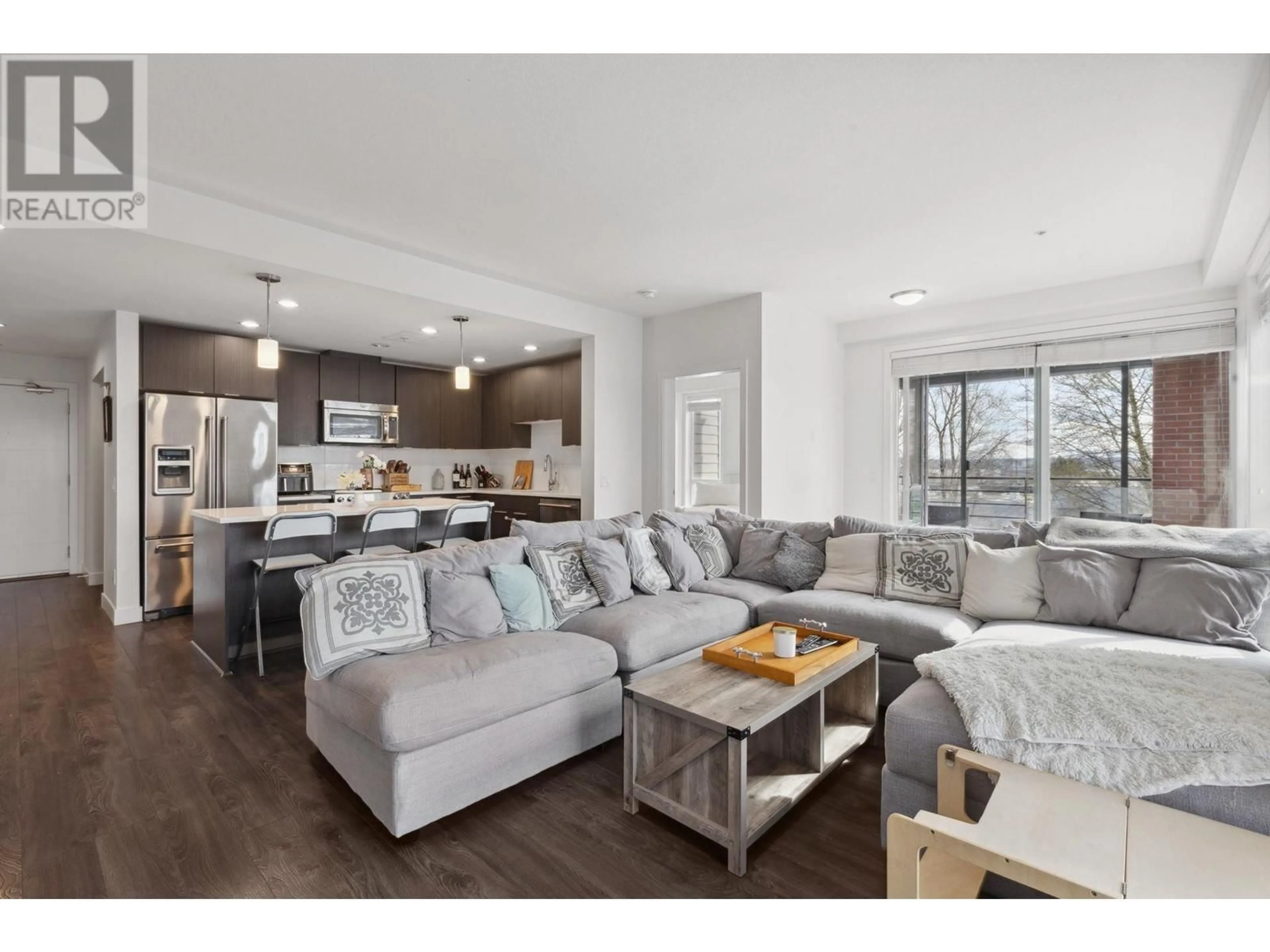 Open concept kitchen, wood/laminate floor for 425 - 723 3RD STREET, North Vancouver British Columbia V7M0E4