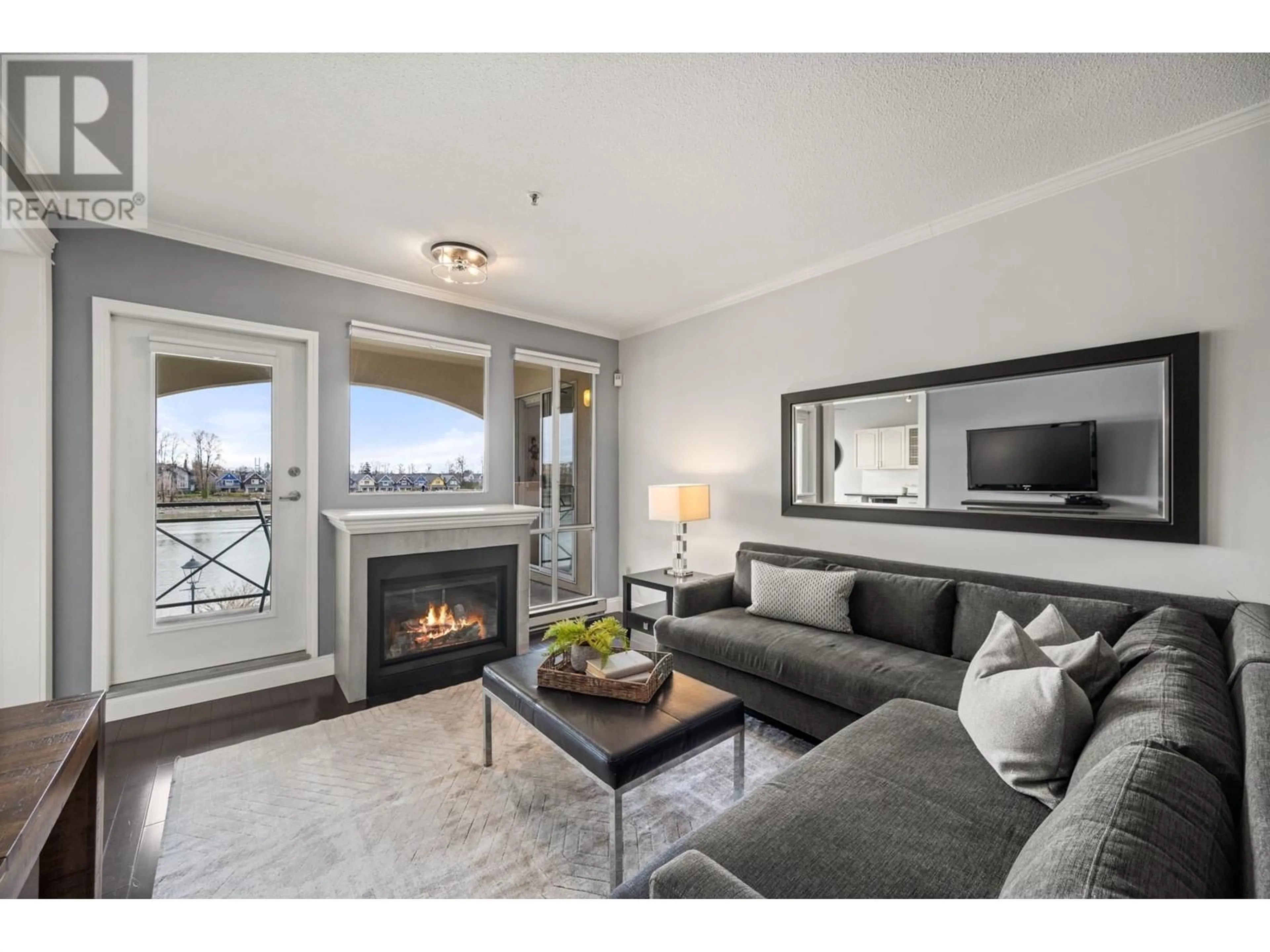 Living room with furniture, unknown for 306 - 2 RENAISSANCE SQUARE, New Westminster British Columbia V3M6K3