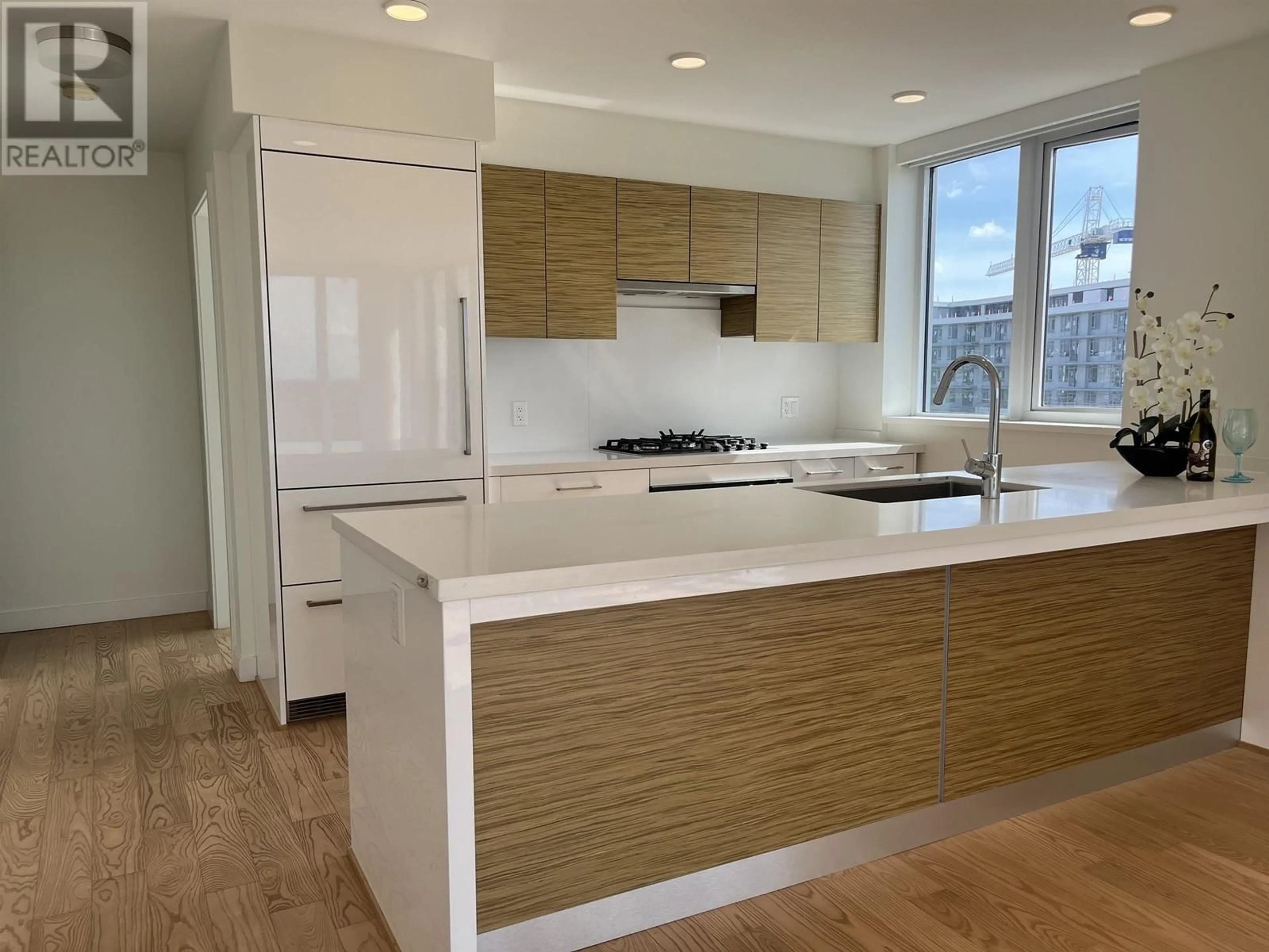 Open concept kitchen, wood/laminate floor for 1506 - 7333 MURDOCH AVENUE, Richmond British Columbia V6Y0J8