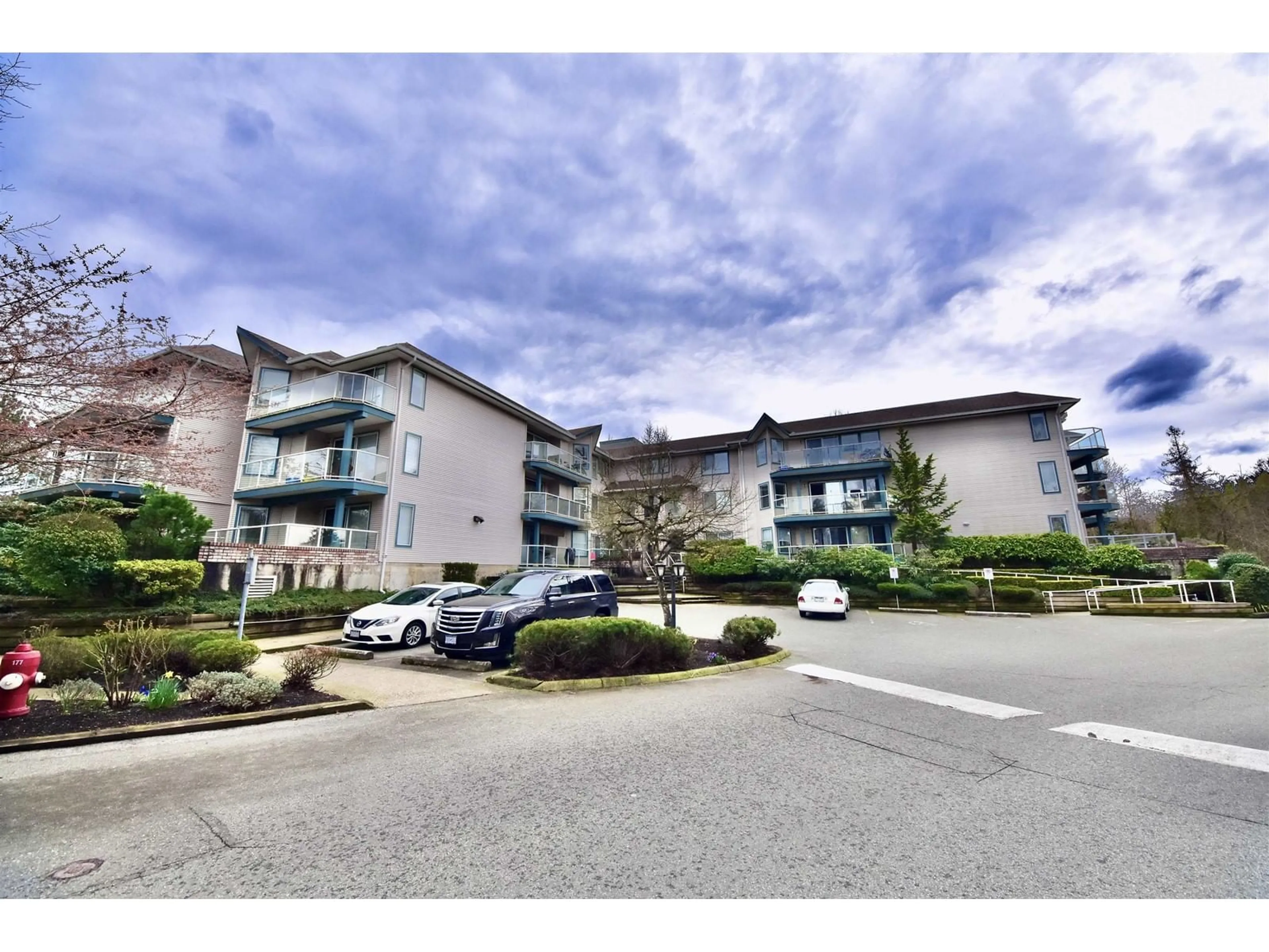 A pic from outside/outdoor area/front of a property/back of a property/a pic from drone, unknown for 205 - 27358 32, Langley British Columbia V4W3M5