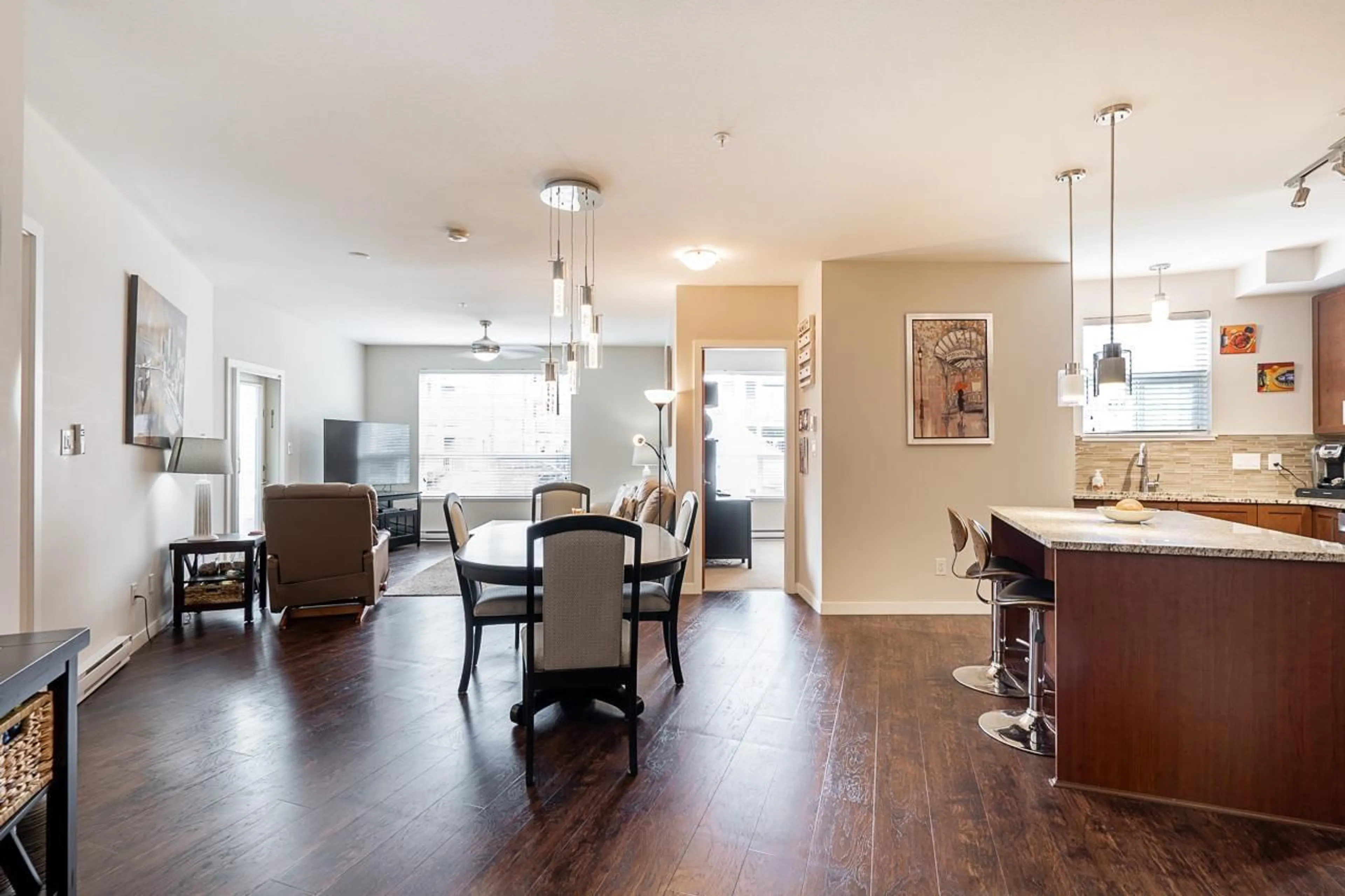Open concept kitchen, wood/laminate floor for 206 - 6480 194, Surrey British Columbia V4N6J9