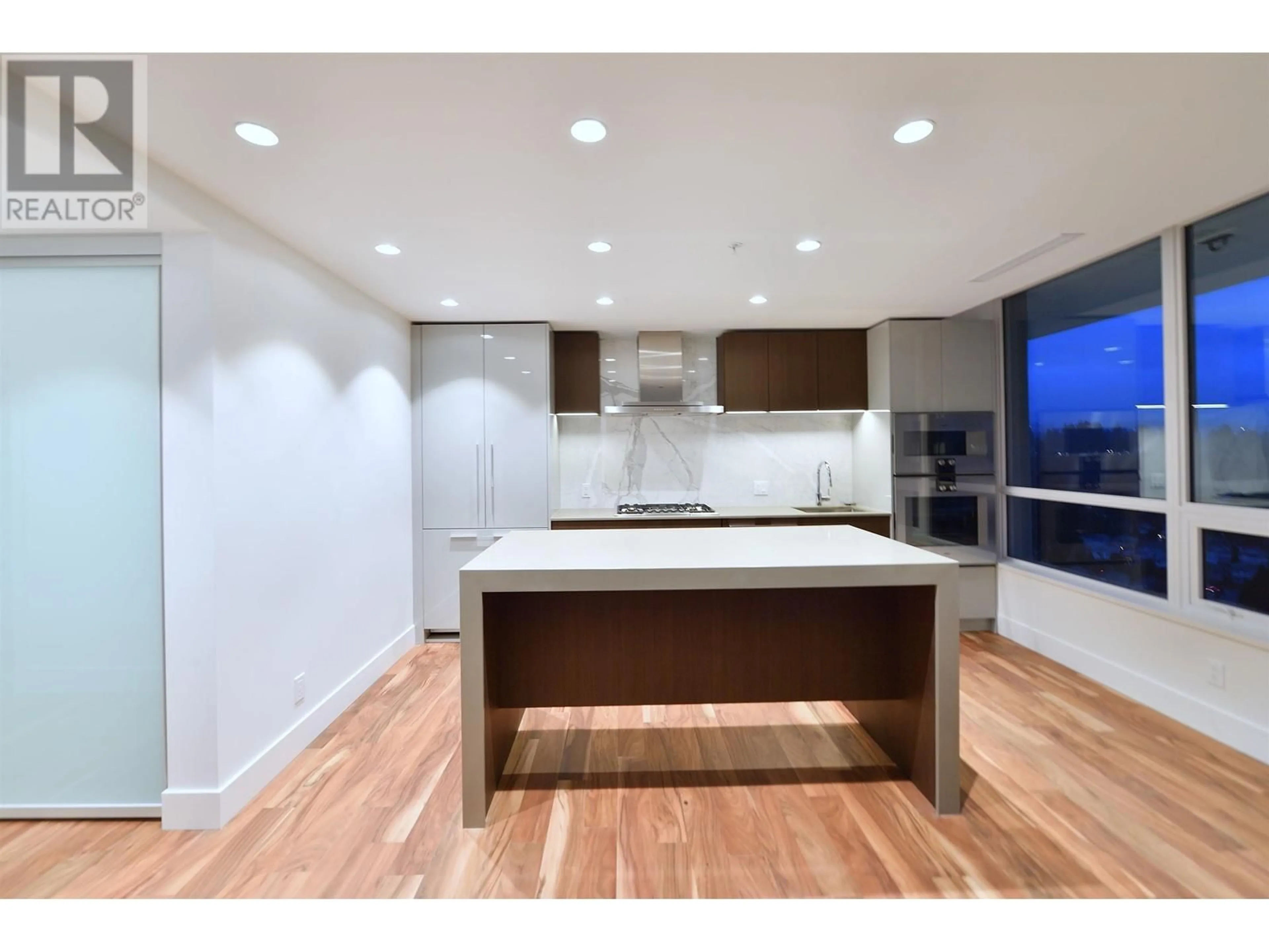 Open concept kitchen, wood/laminate floor for 1703 - 1675 LIONS GATE LANE, North Vancouver British Columbia V7P0E3