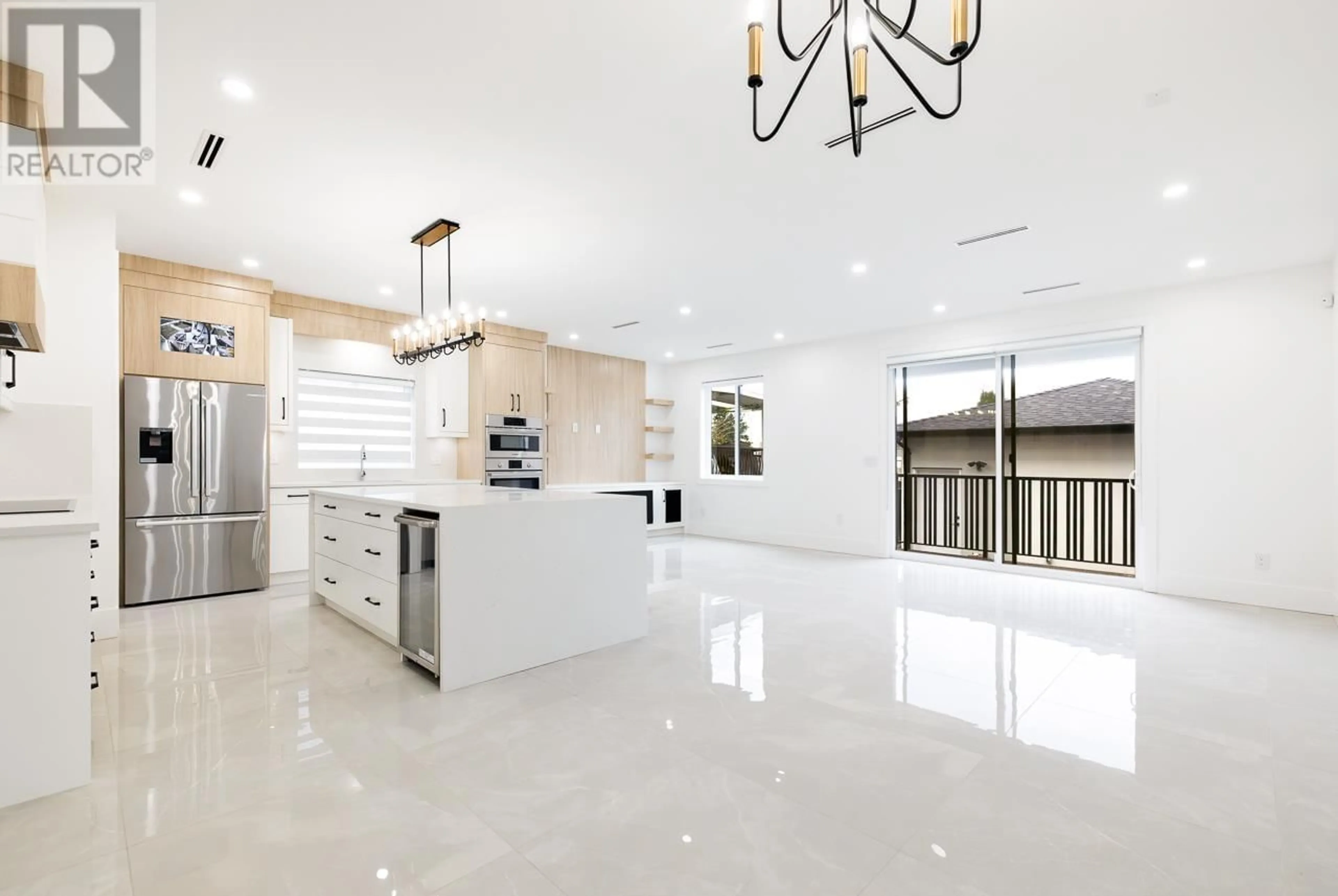 Open concept kitchen, ceramic/tile floor for 7707 BURGESS STREET, Burnaby British Columbia V3N3J1