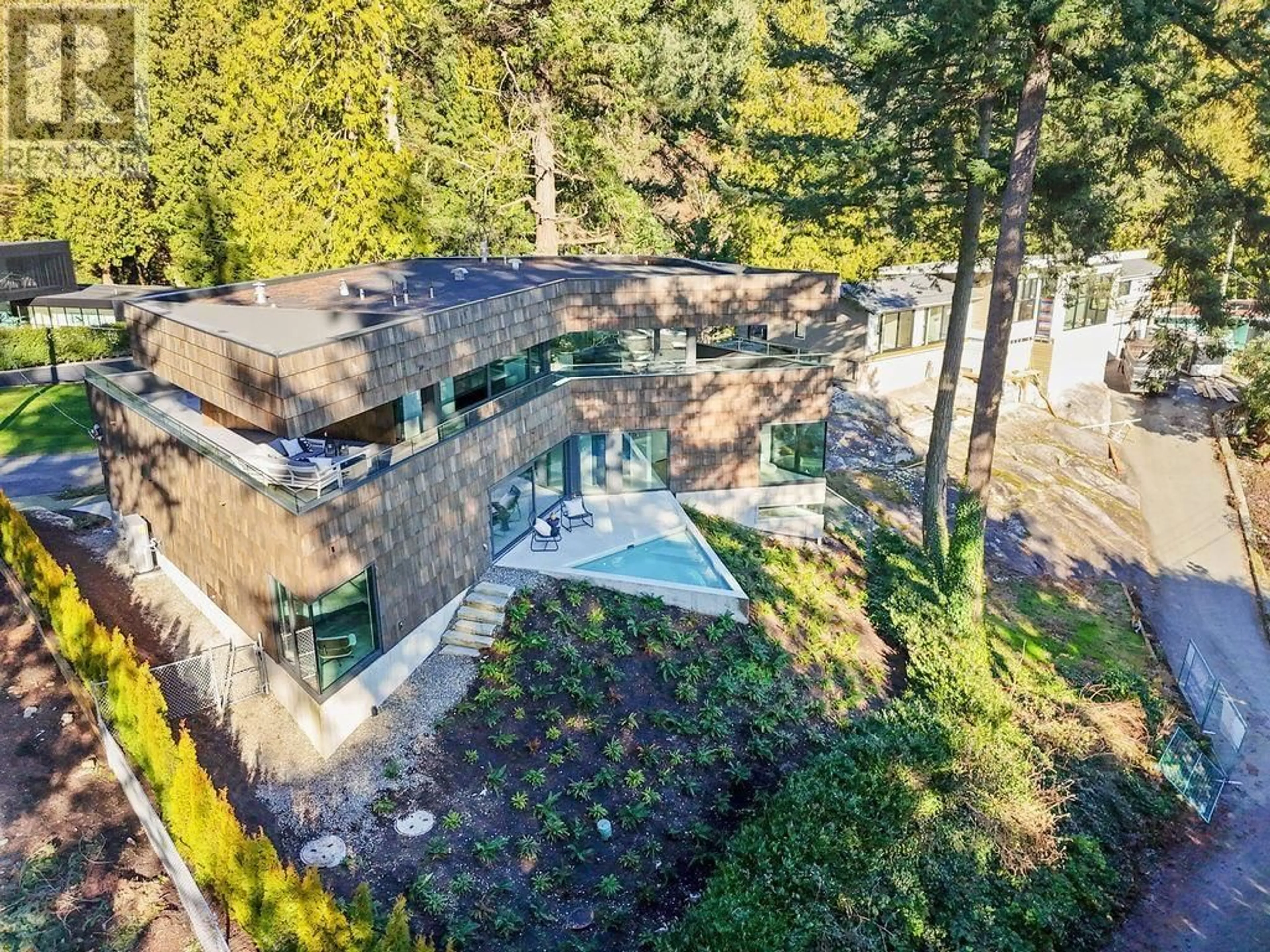 A pic from outside/outdoor area/front of a property/back of a property/a pic from drone, forest/trees view for 4166 ROSE CRESCENT, West Vancouver British Columbia V7V2N8