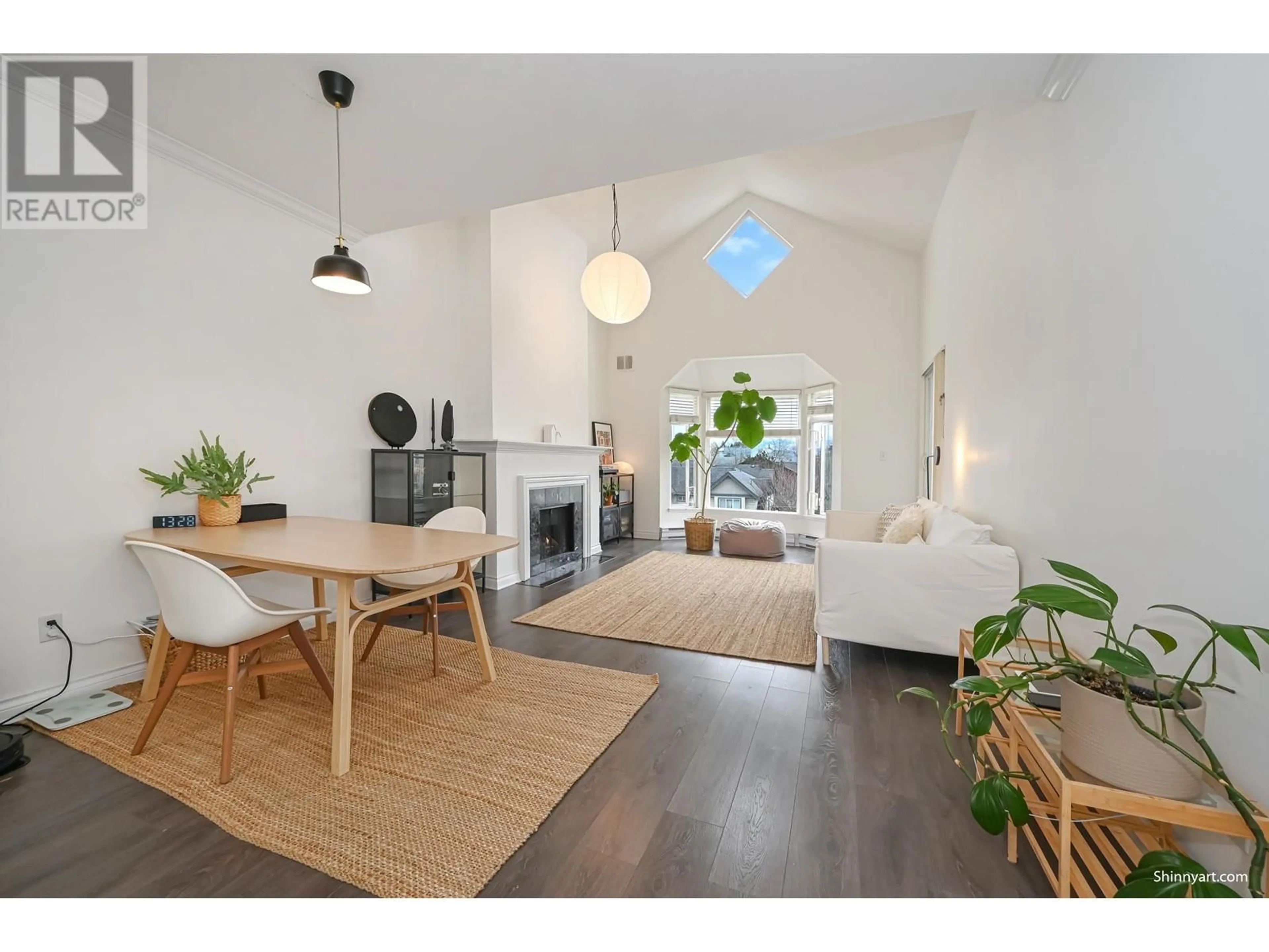 Living room with furniture, wood/laminate floor for 308 - 7633 ST. ALBANS ROAD, Richmond British Columbia V6Y3W7