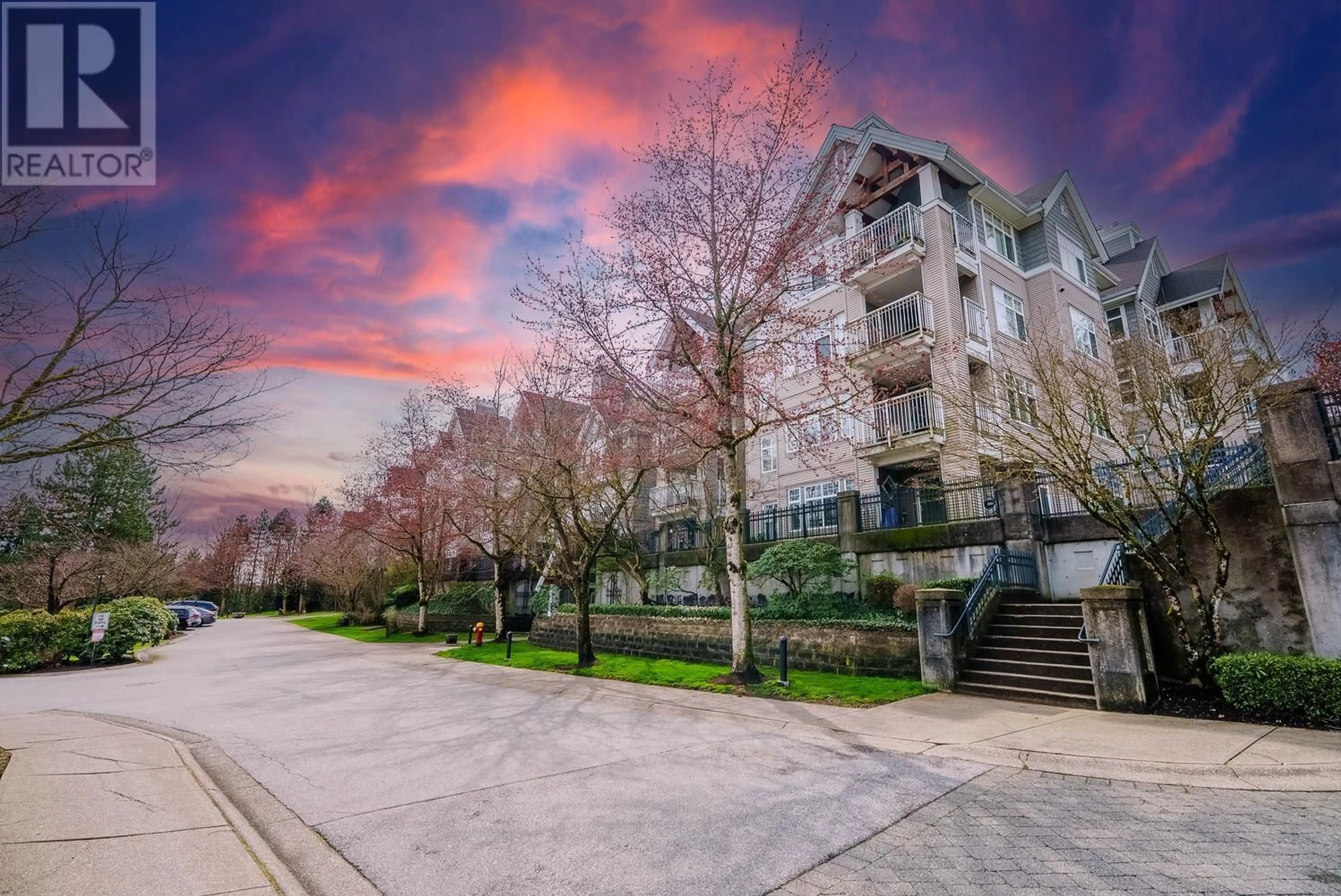 A pic from outside/outdoor area/front of a property/back of a property/a pic from drone, unknown for 104 - 1432 PARKWAY BOULEVARD, Coquitlam British Columbia V3E3L9
