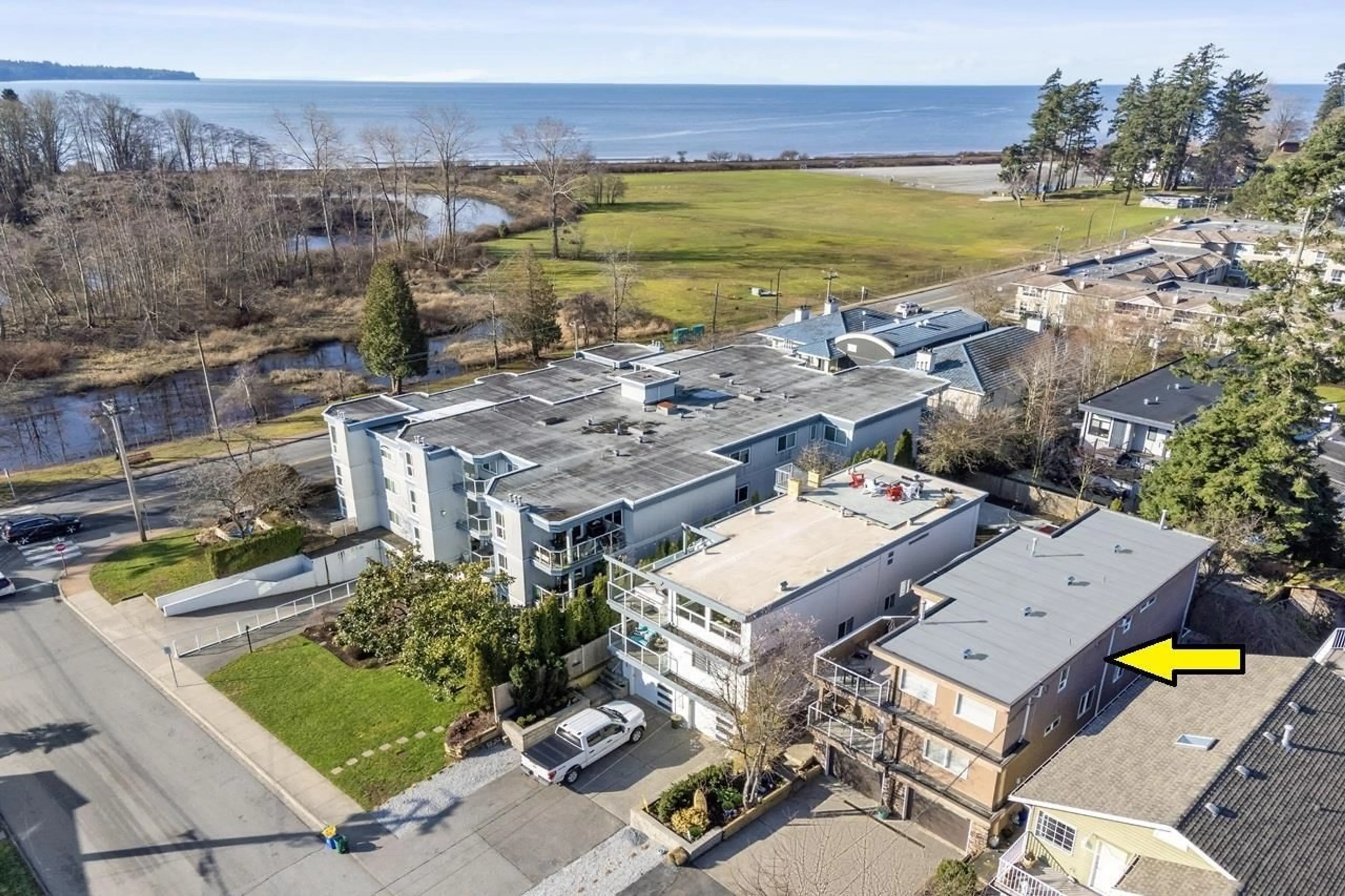 A pic from outside/outdoor area/front of a property/back of a property/a pic from drone, water/lake/river/ocean view for 835 STEVENS, White Rock British Columbia V4B4X3