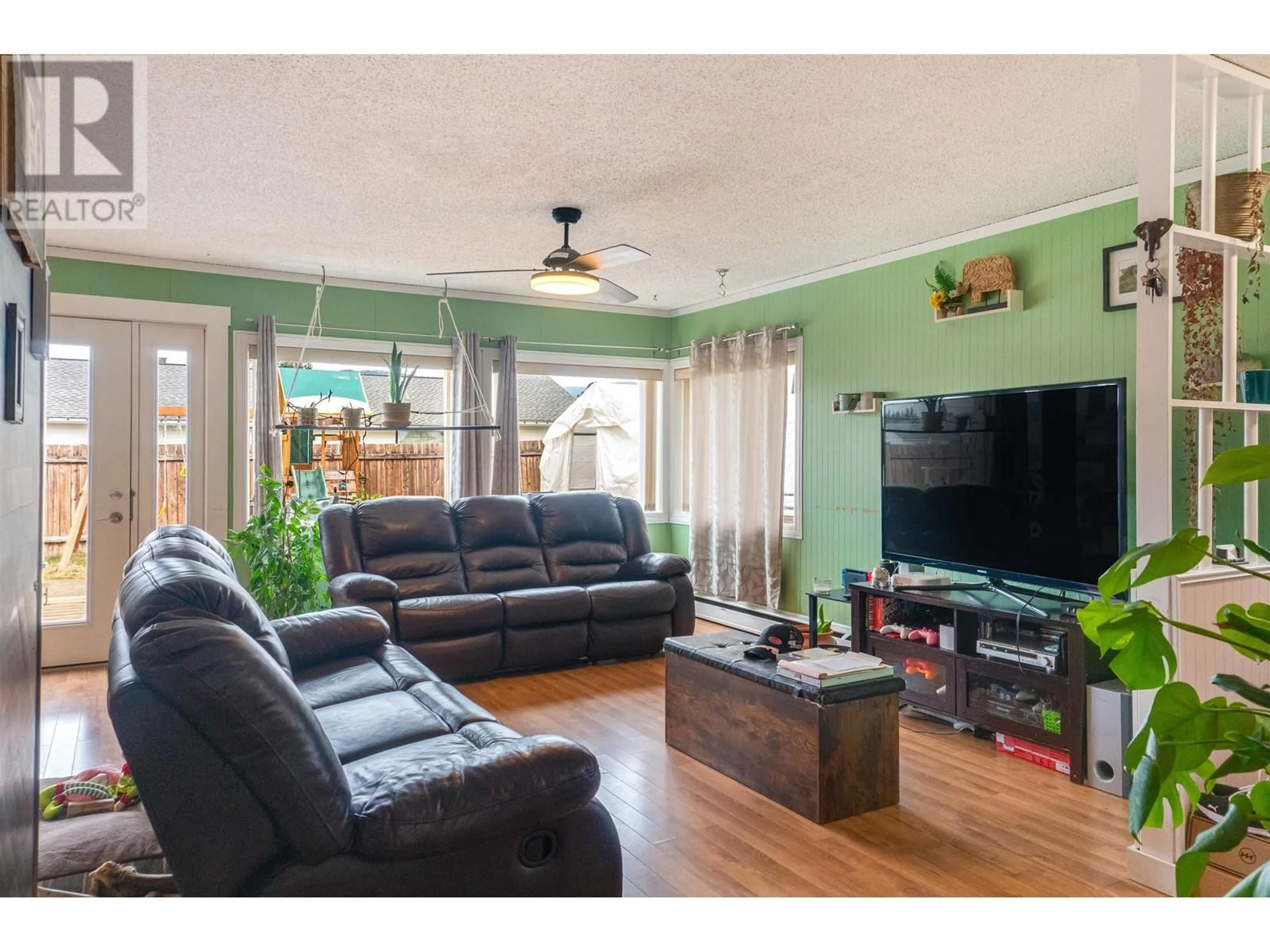 Living room with furniture, wood/laminate floor for 110 WILLISCROFT STREET, Kitimat British Columbia V8C1H5