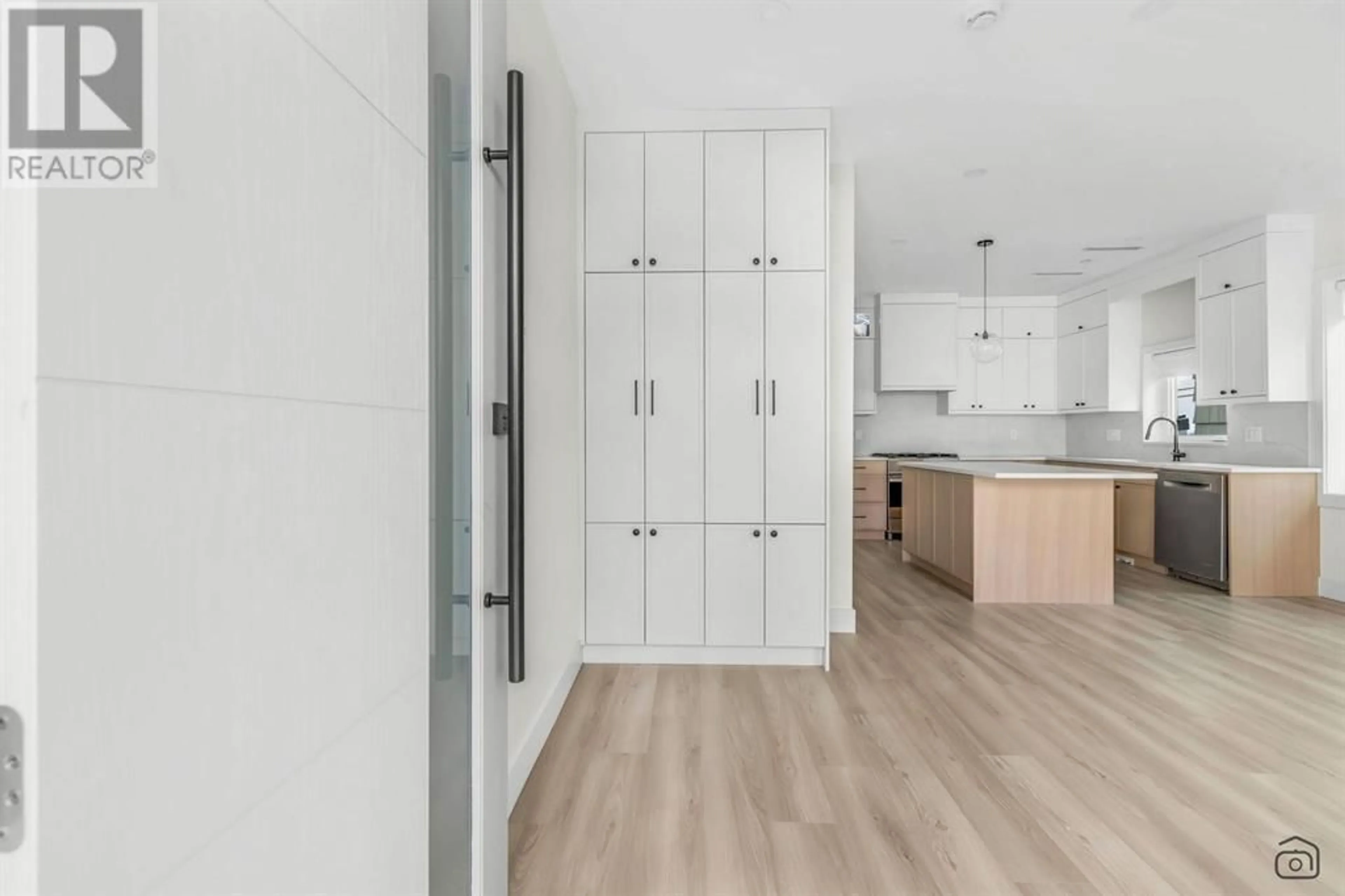 Open concept kitchen, wood/laminate floor for 718 62ND AVENUE, Vancouver British Columbia V5X2G5