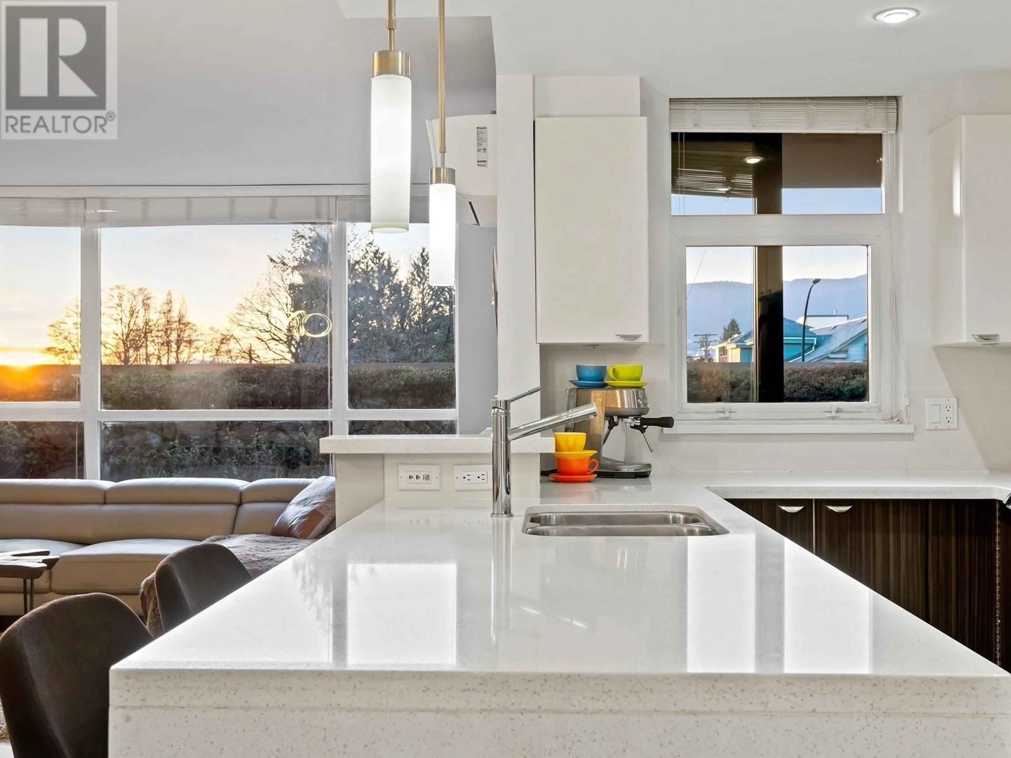 Contemporary kitchen, ceramic/tile floor for 308 - 160 3RD STREET, North Vancouver British Columbia V7M0A9