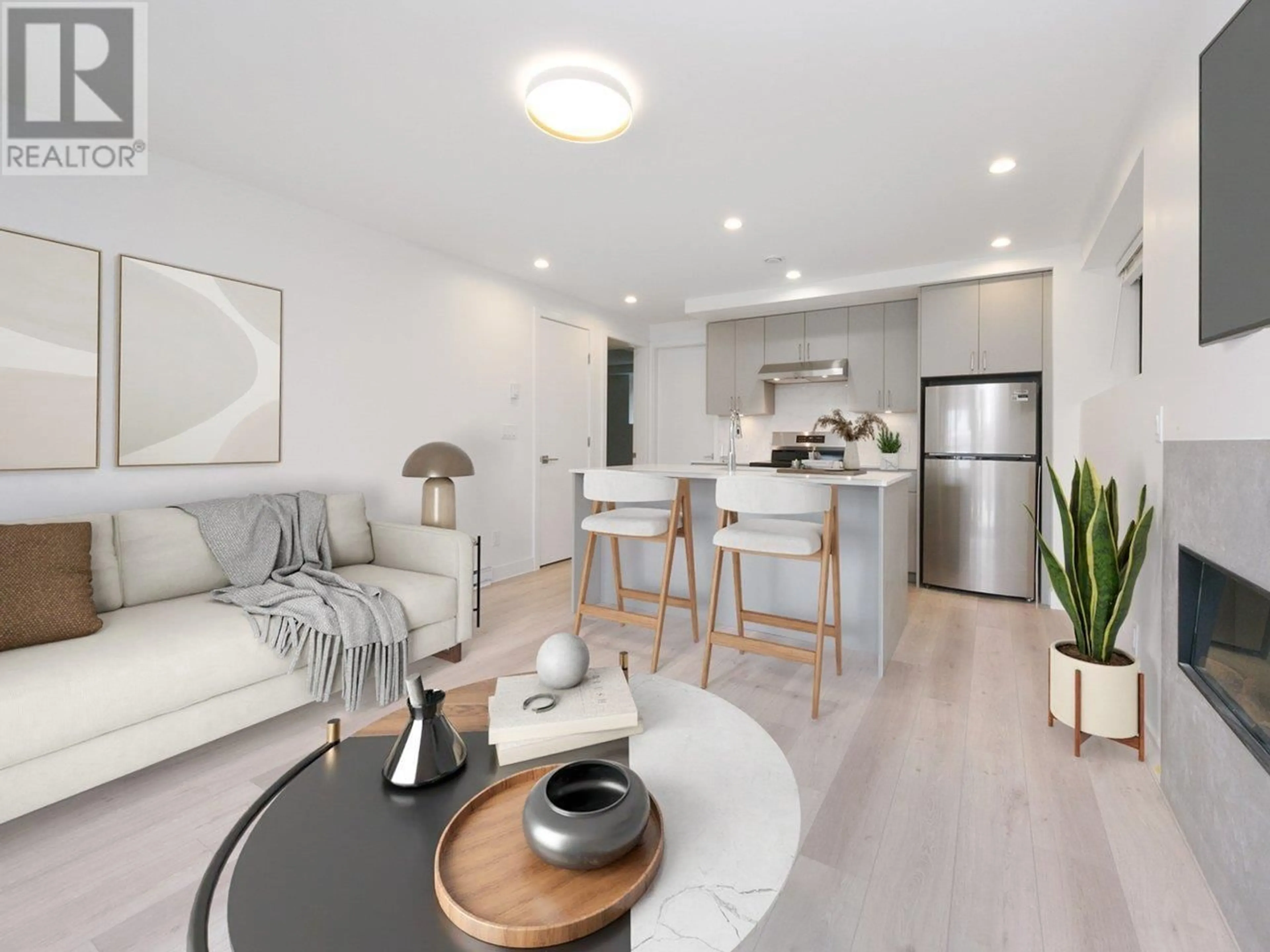Open concept kitchen, wood/laminate floor for 1119 KEITH ROAD, North Vancouver British Columbia V7L1X4