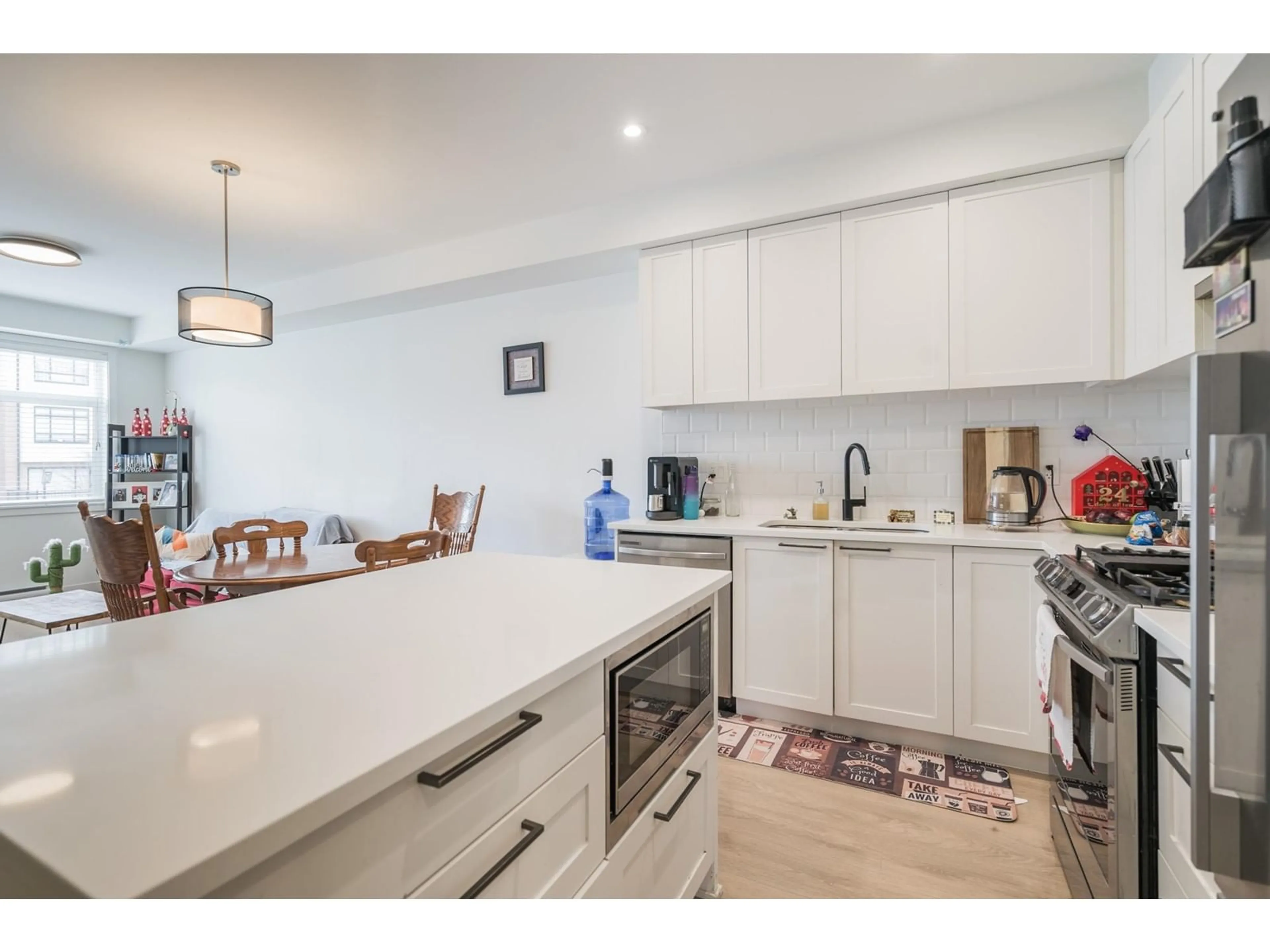 Open concept kitchen, ceramic/tile floor for 227 - 5415 BRYDON, Langley British Columbia V3A0N4