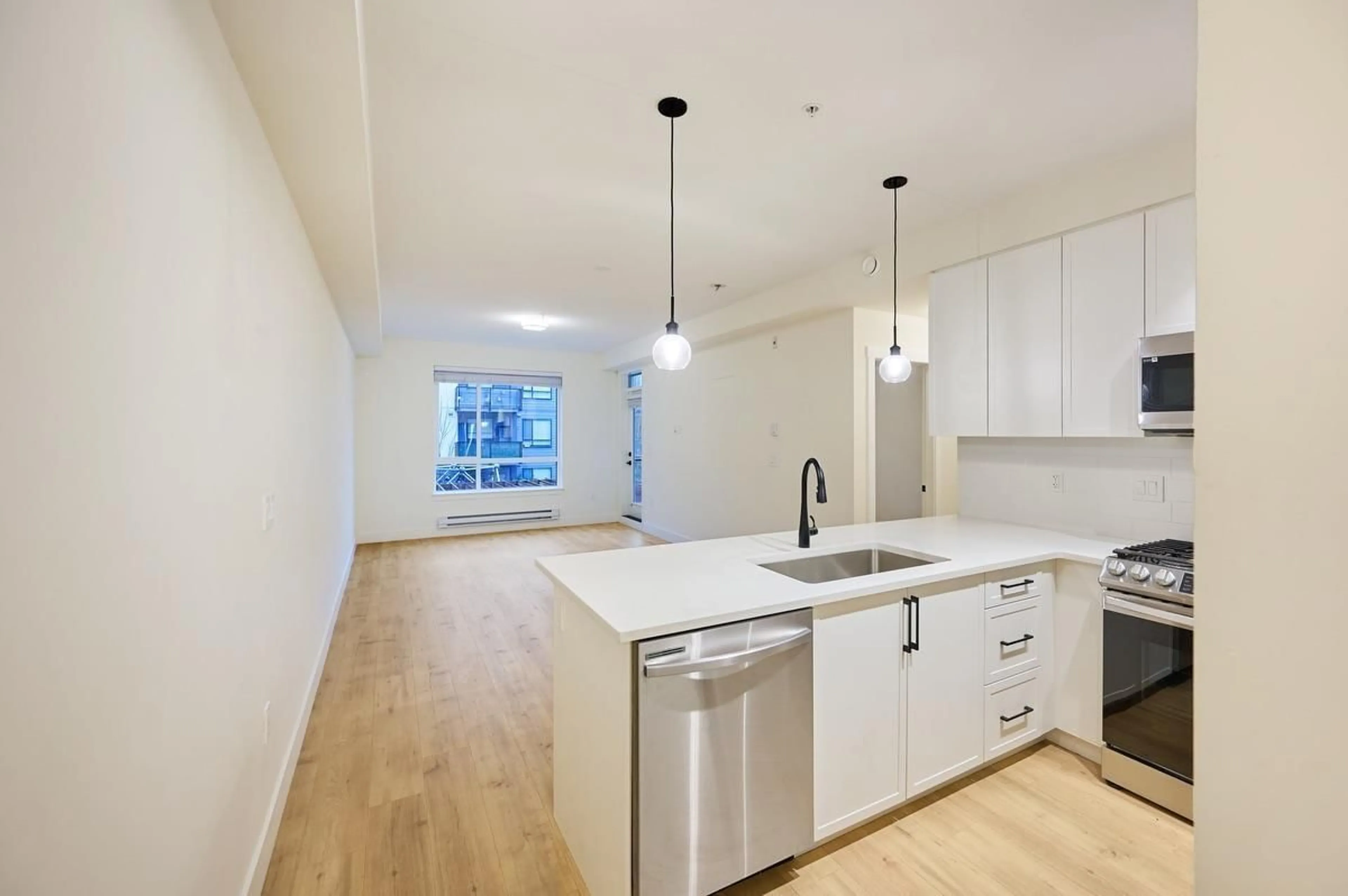 Open concept kitchen, unknown for 225 - 7506 199A, Langley British Columbia V2Y3K9