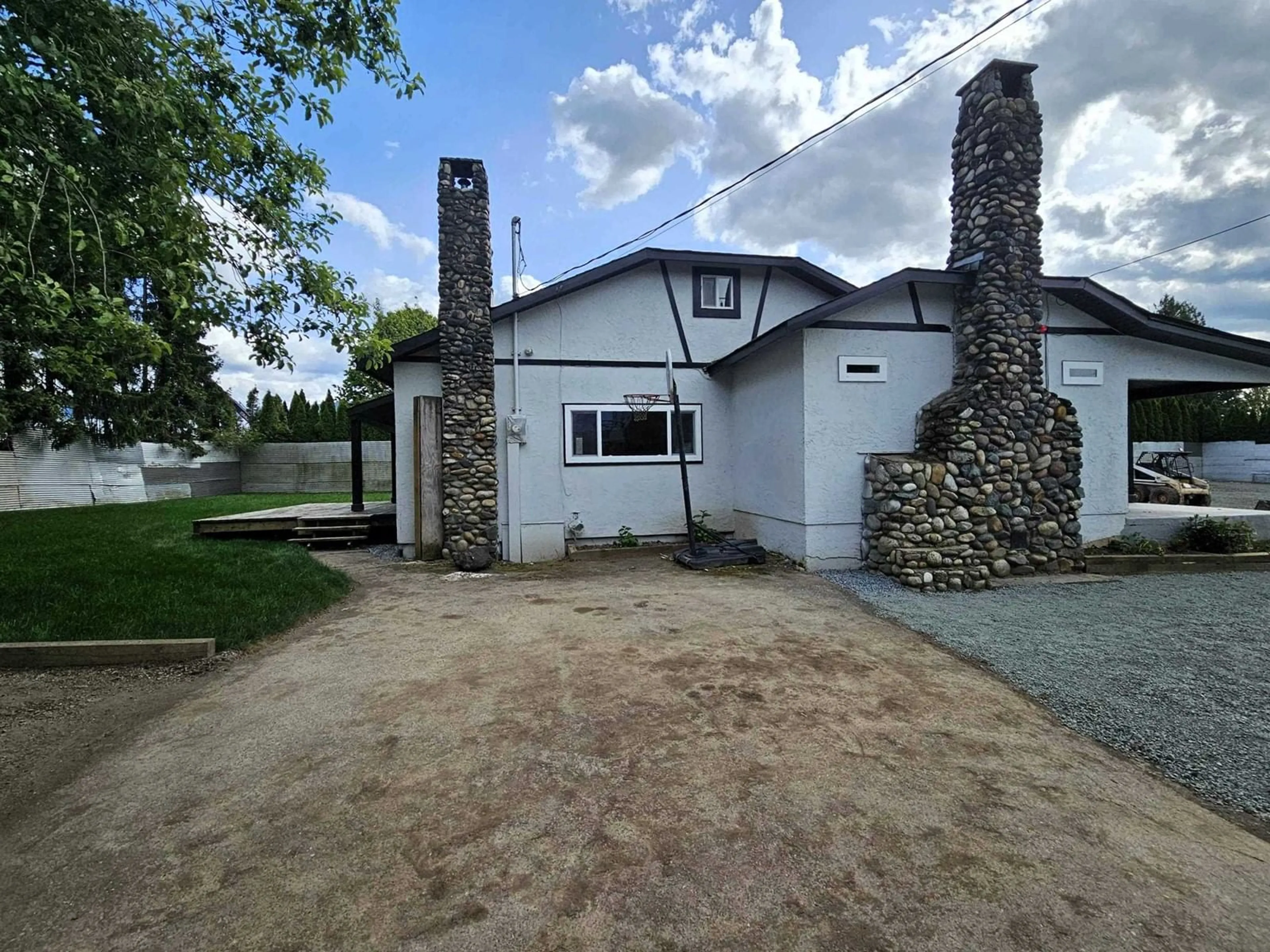 A pic from outside/outdoor area/front of a property/back of a property/a pic from drone, street for 7088 SUMAS PRAIRIE ROAD, Chilliwack British Columbia V2R4K1