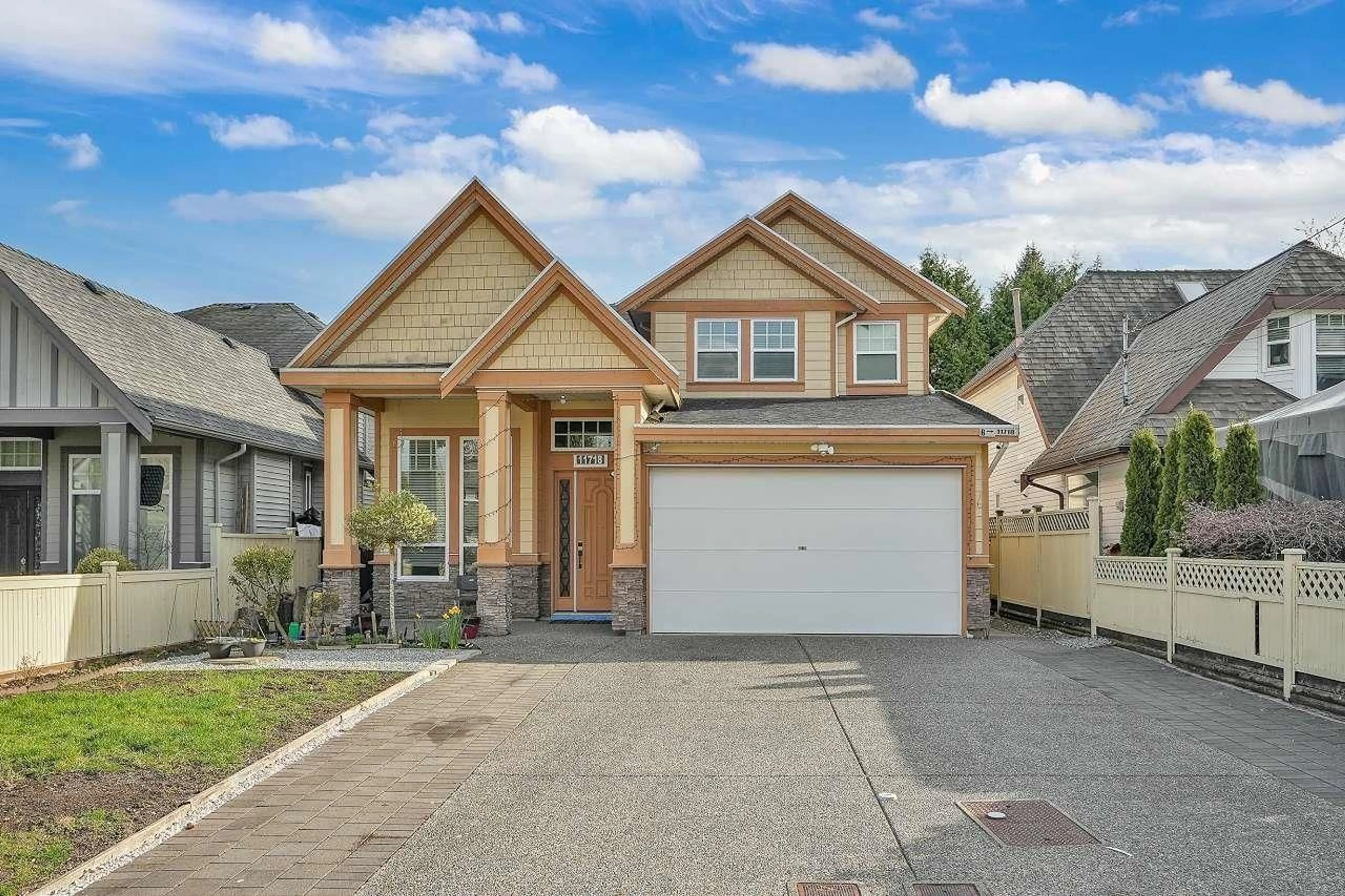 Home with vinyl exterior material, street for 11718 84, Delta British Columbia V4C2M3