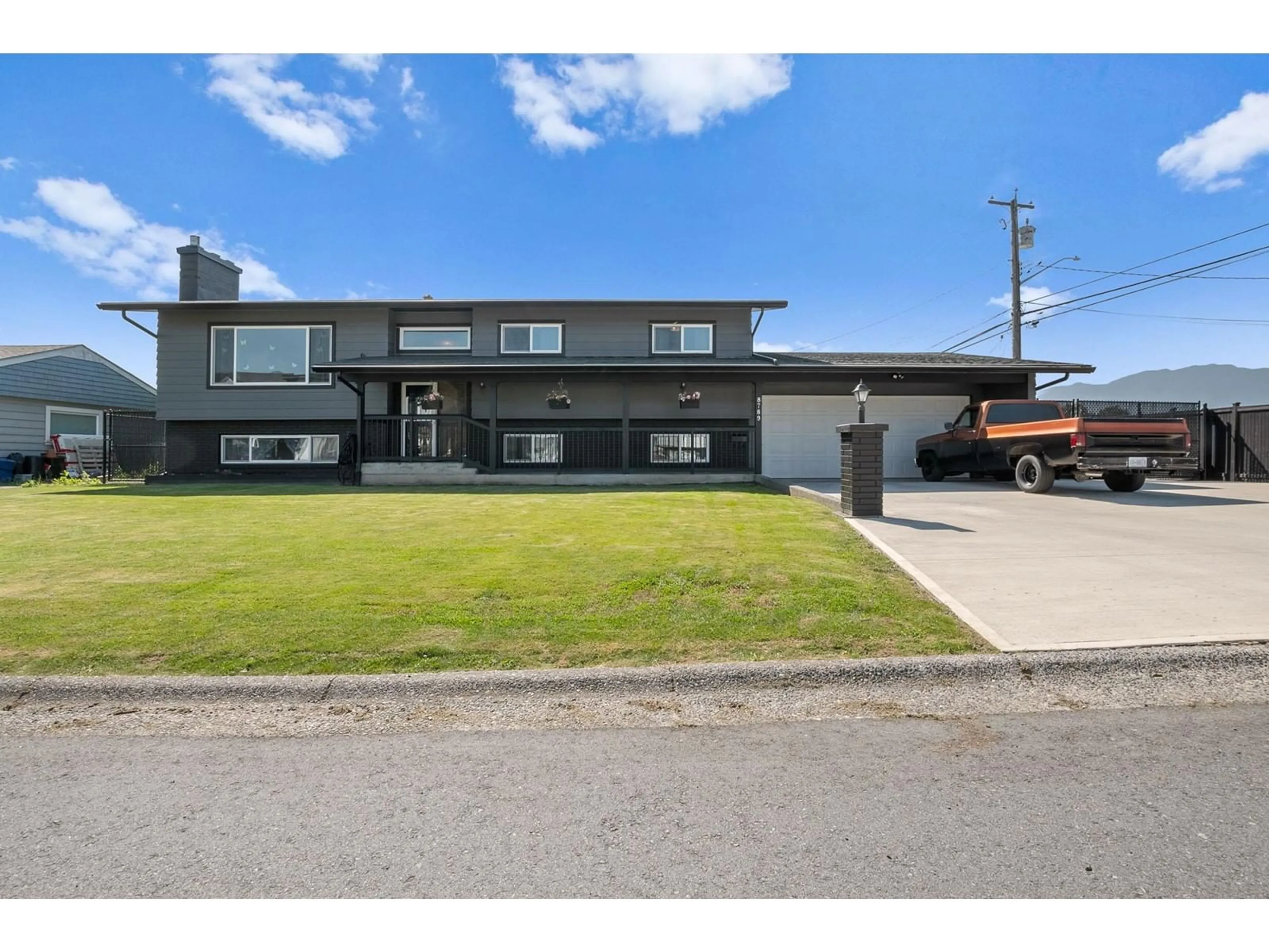 Home with vinyl exterior material, street for 8789 BUTCHART STREET, Chilliwack British Columbia V2P5S2