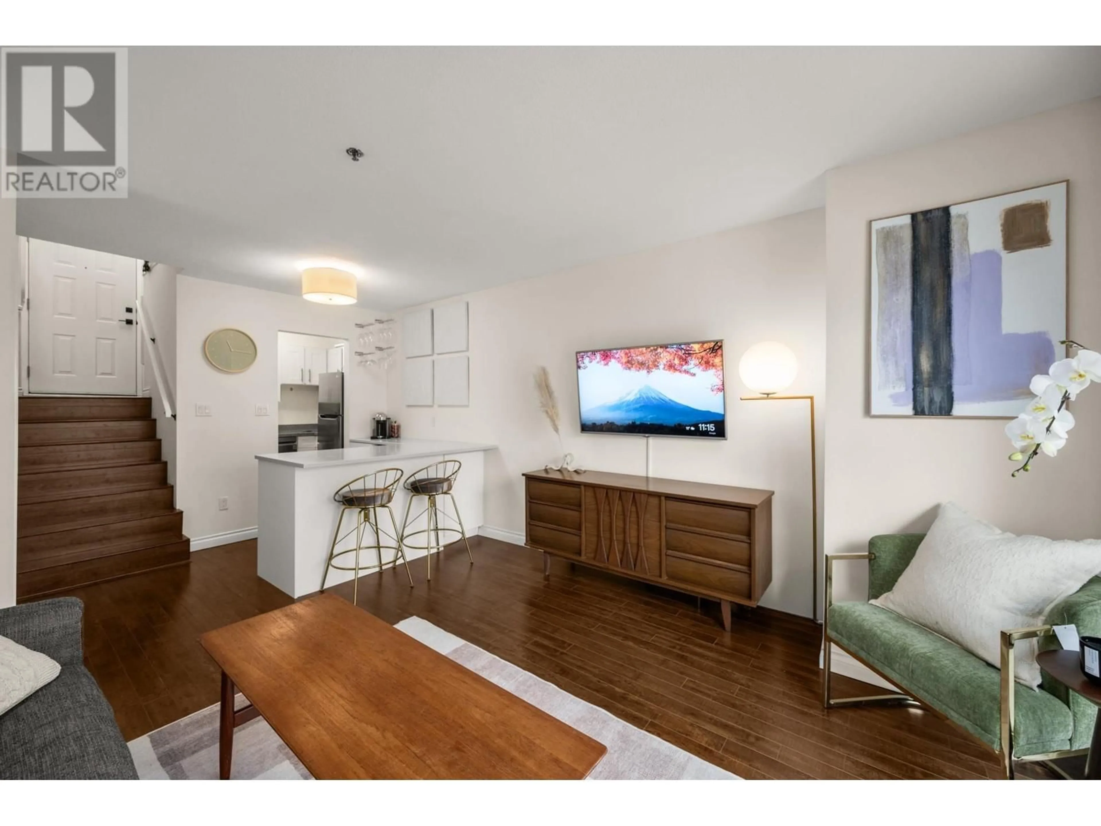 Living room with furniture, wood/laminate floor for 204 - 1205 14TH AVENUE, Vancouver British Columbia V6H1P7