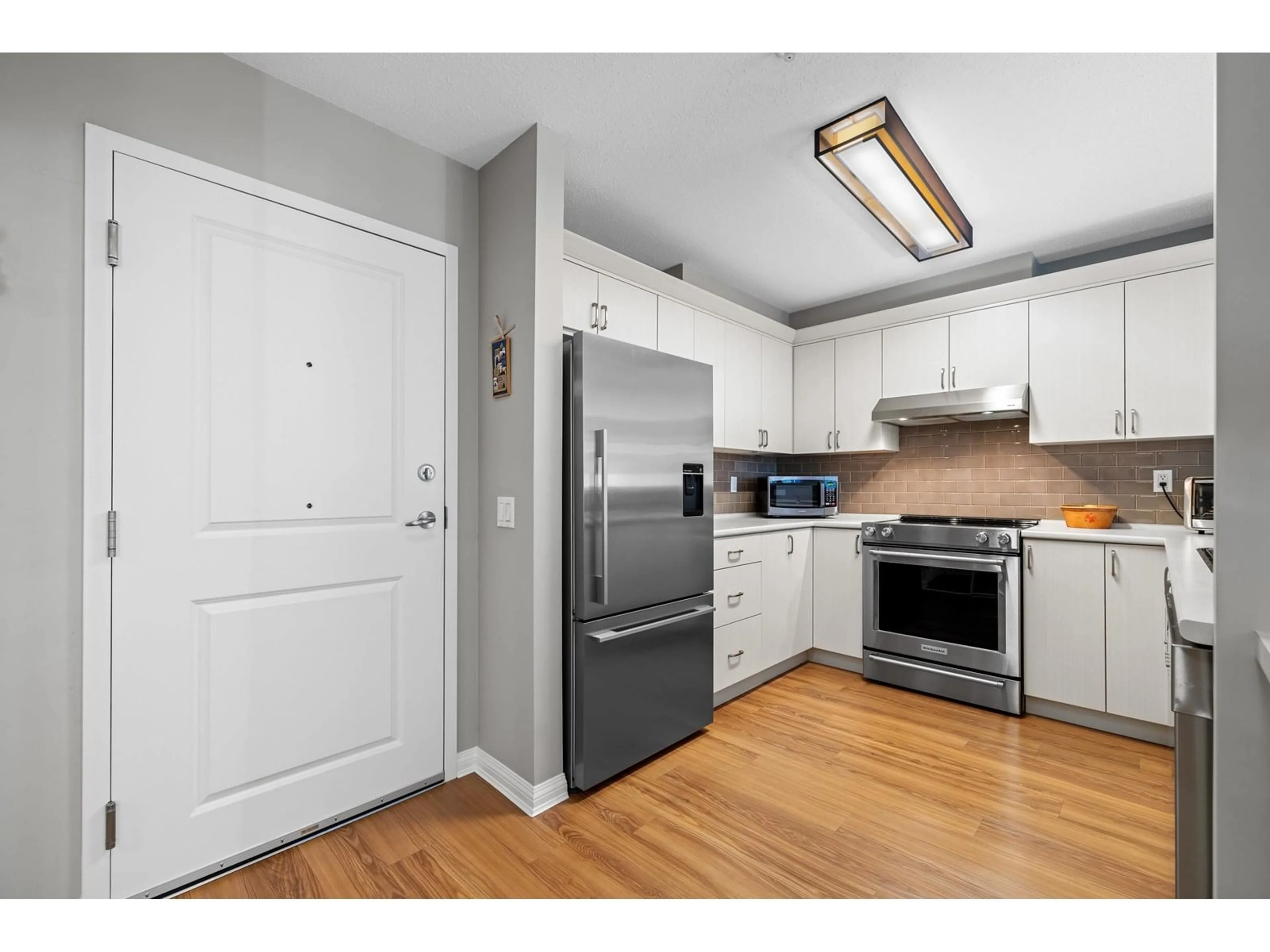Standard kitchen, wood/laminate floor for 221 - 8880 202, Langley British Columbia V1M4E7