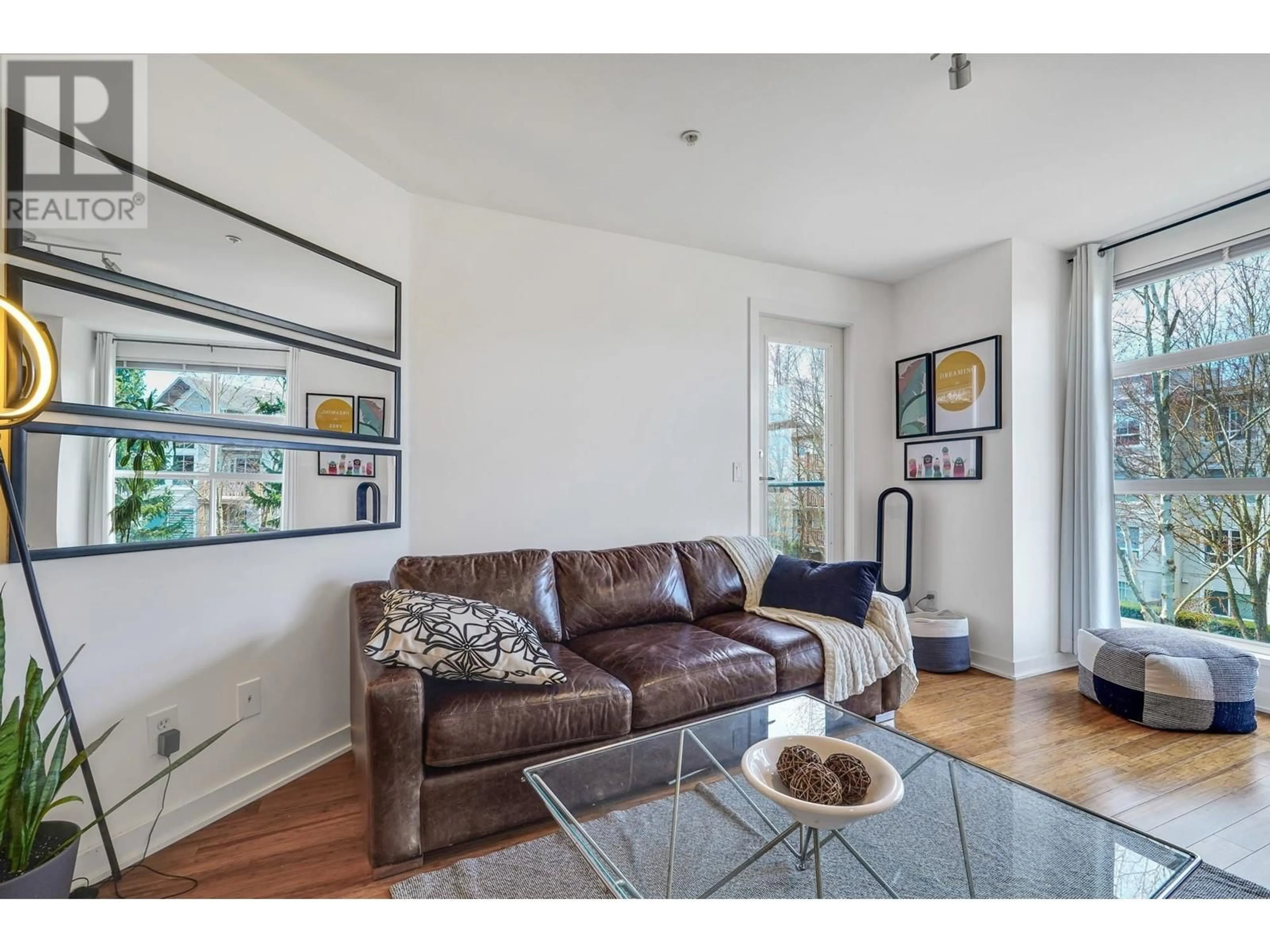 Living room with furniture, wood/laminate floor for 338 - 5700 ANDREWS ROAD, Richmond British Columbia V7E6N7