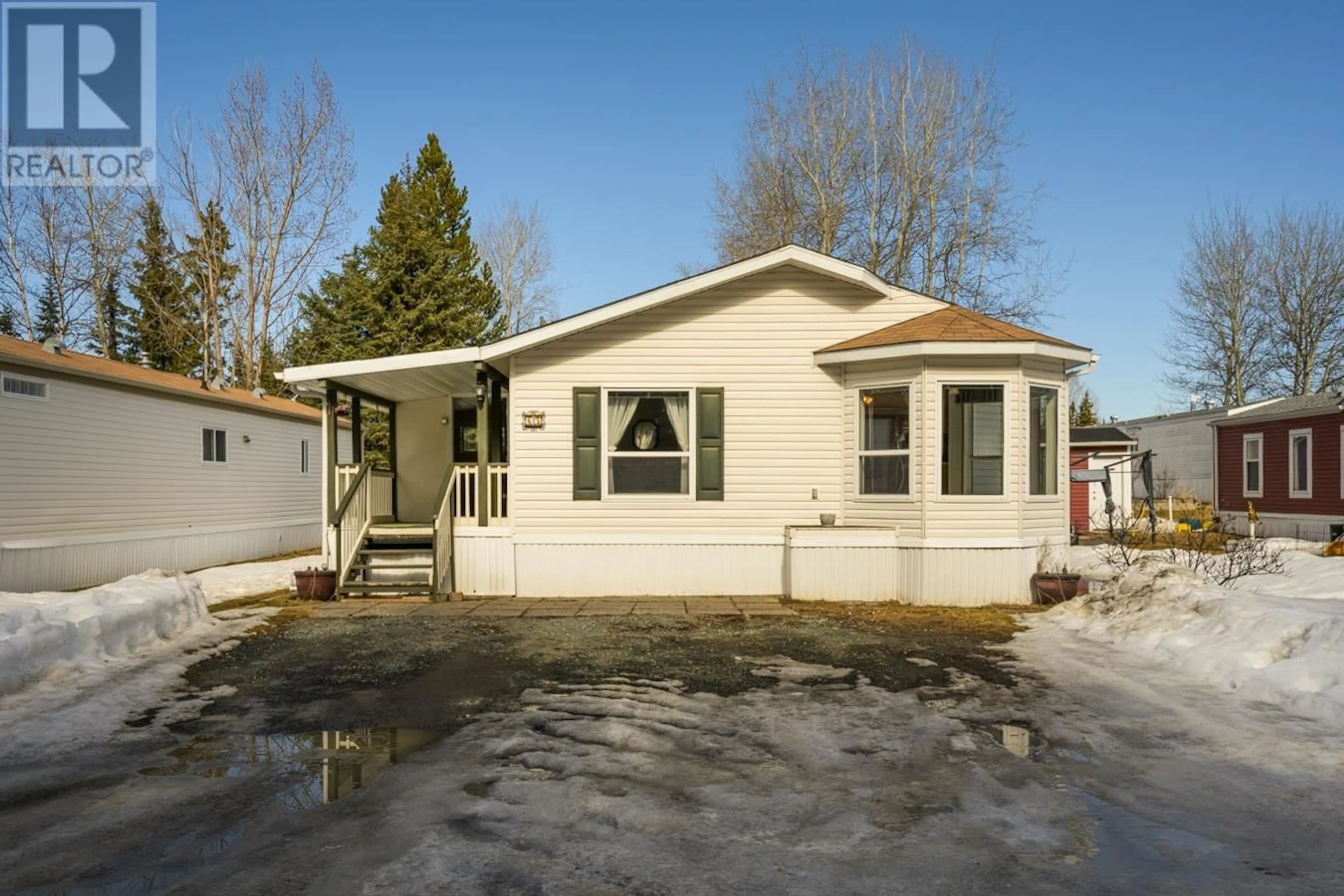 Home with vinyl exterior material, street for 65 - 7817 97 HIGHWAY, Prince George British Columbia V2N6P6