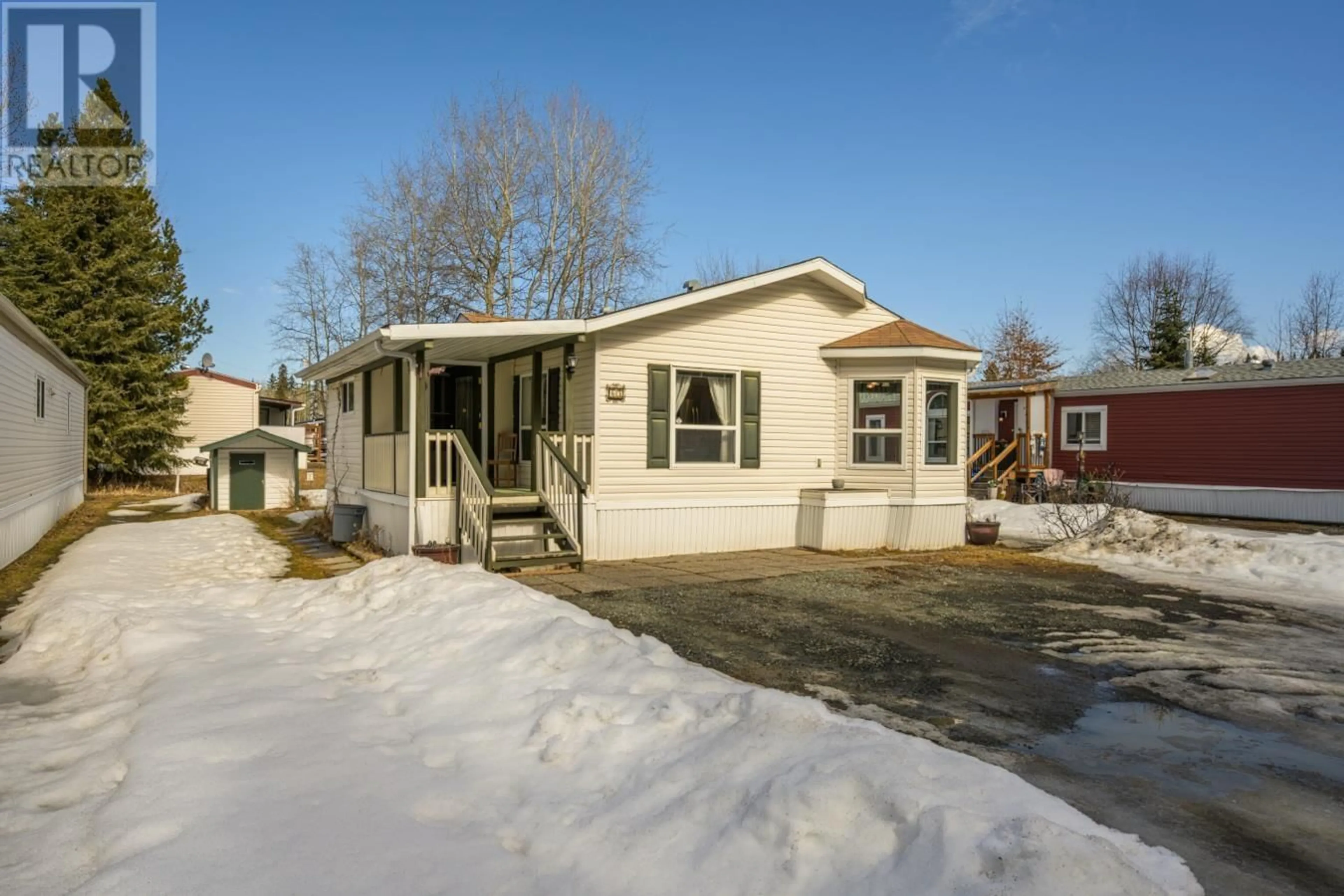 Home with vinyl exterior material, street for 65 - 7817 97 HIGHWAY, Prince George British Columbia V2N6P6