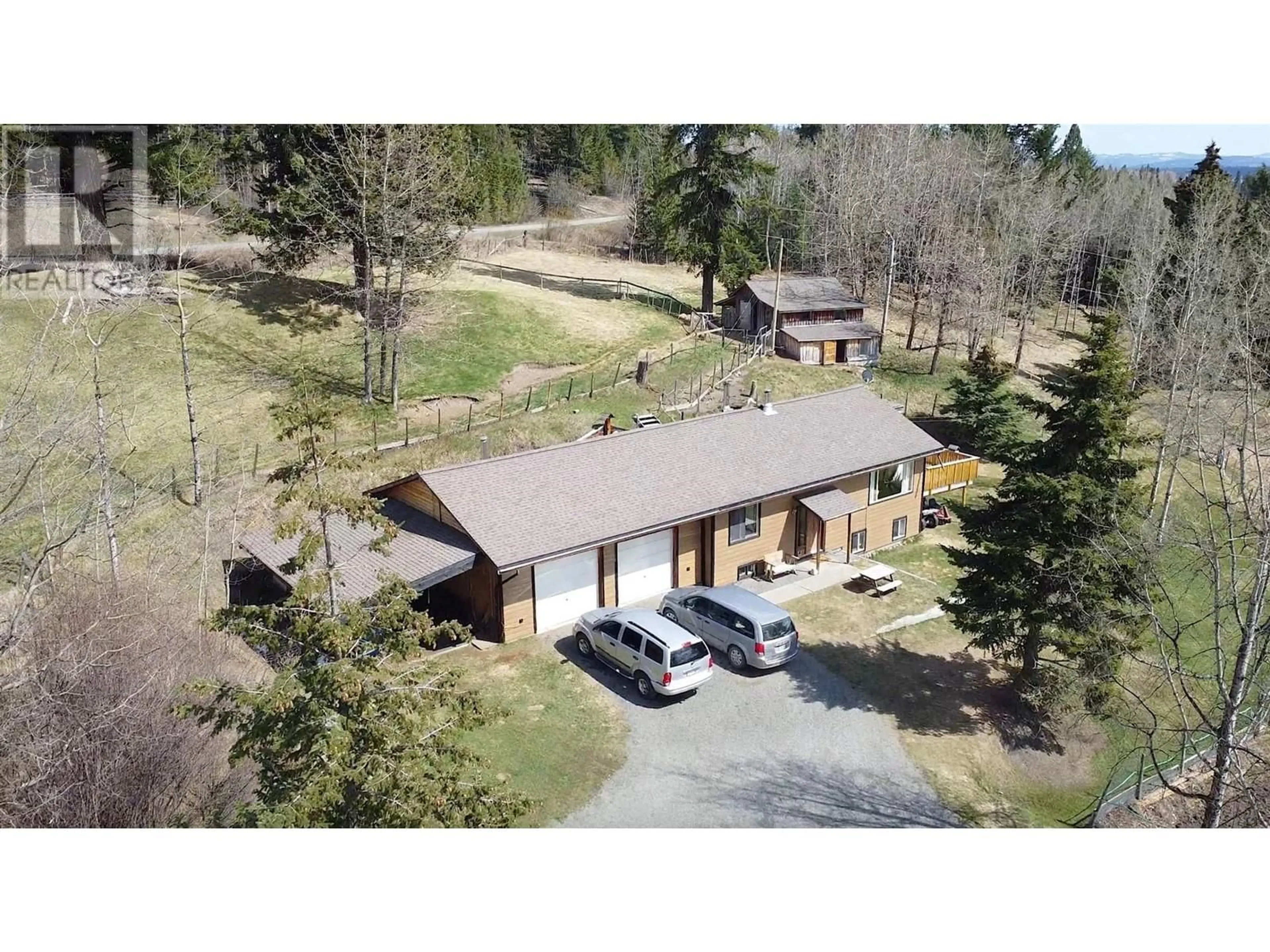 A pic from outside/outdoor area/front of a property/back of a property/a pic from drone, unknown for 7115 CONNIE ROAD, Bridge Lake British Columbia V0K1X2