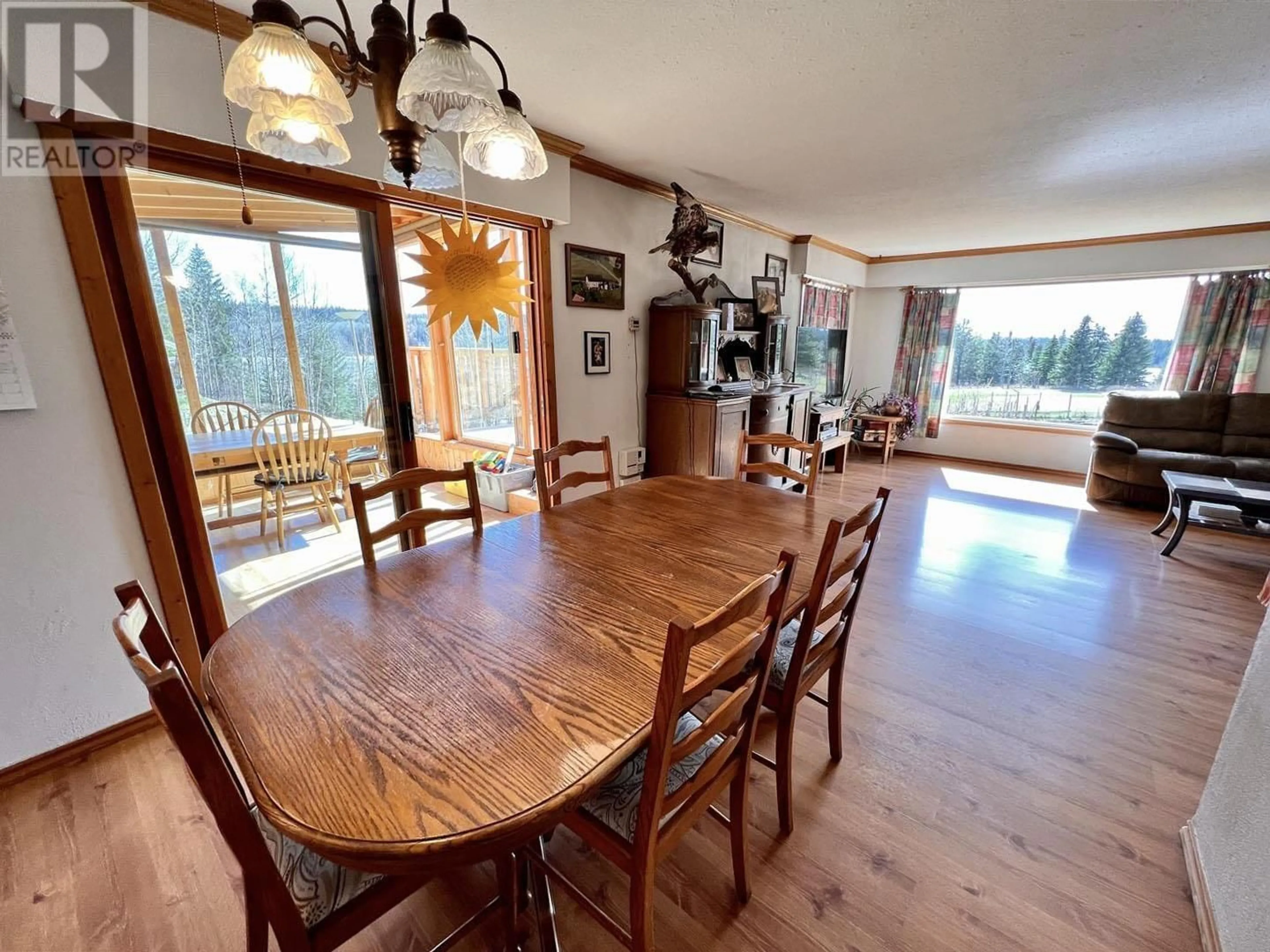Dining room, wood/laminate floor for 7115 CONNIE ROAD, Bridge Lake British Columbia V0K1X2