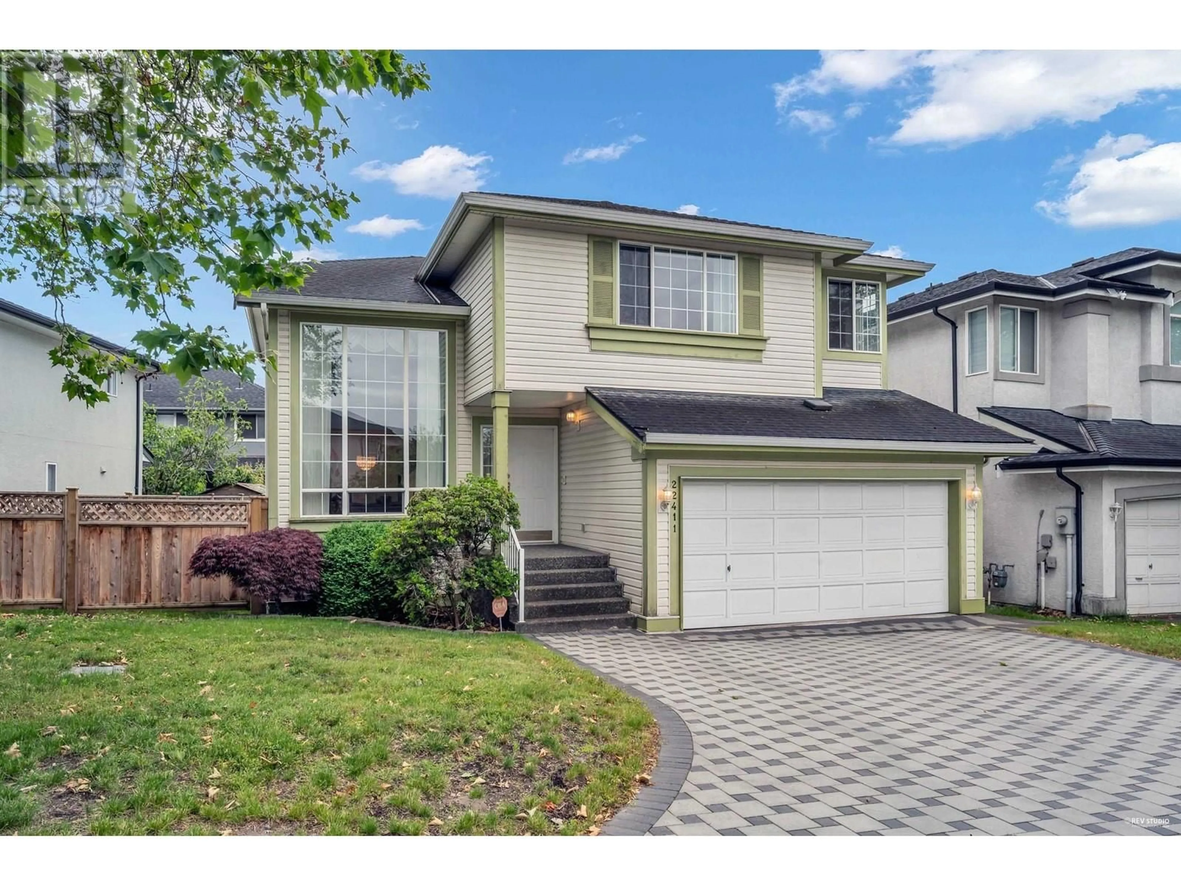 Home with vinyl exterior material, street for 22411 COCHRANE DRIVE, Richmond British Columbia V6V2T9
