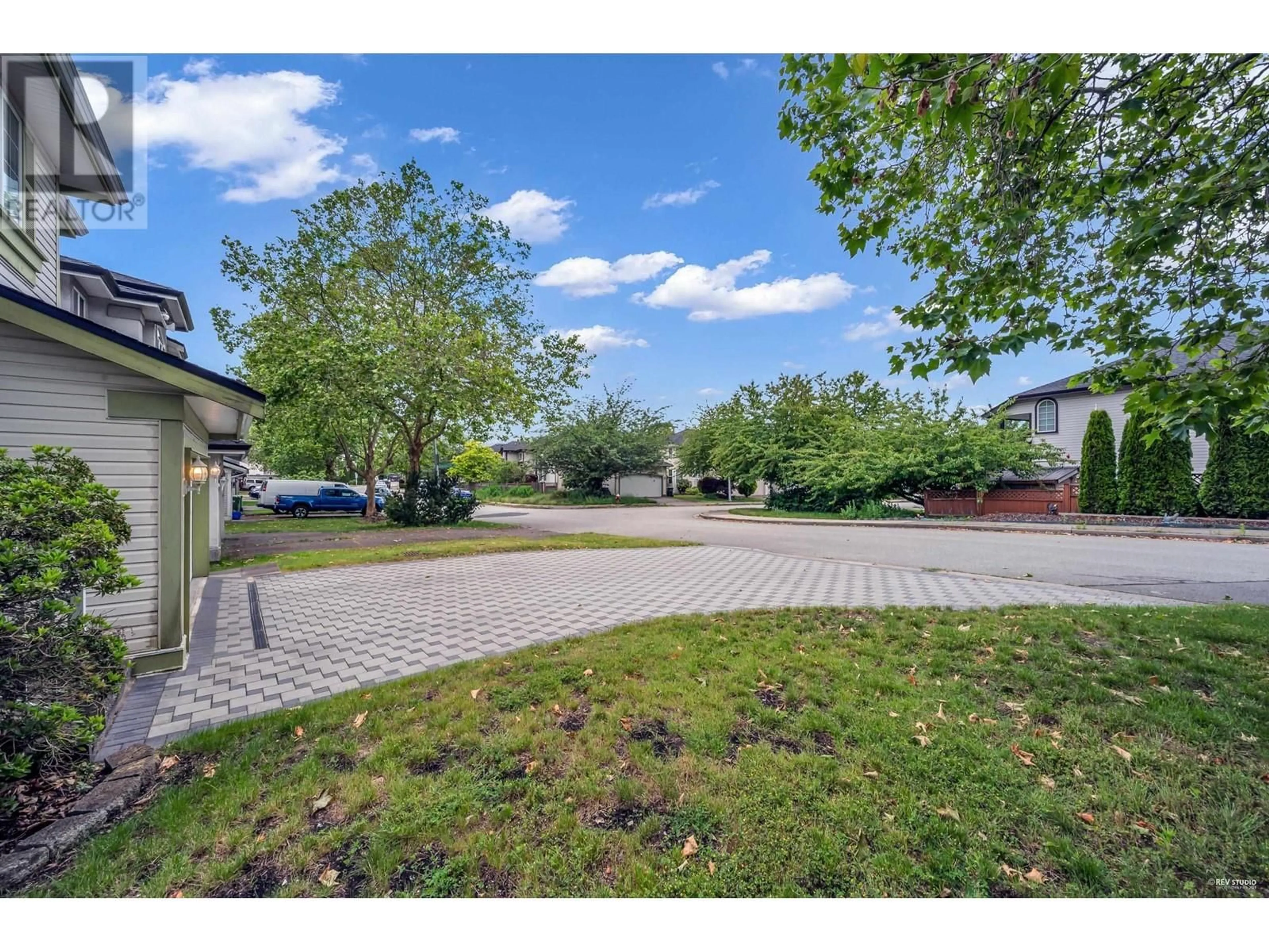 A pic from outside/outdoor area/front of a property/back of a property/a pic from drone, street for 22411 COCHRANE DRIVE, Richmond British Columbia V6V2T9