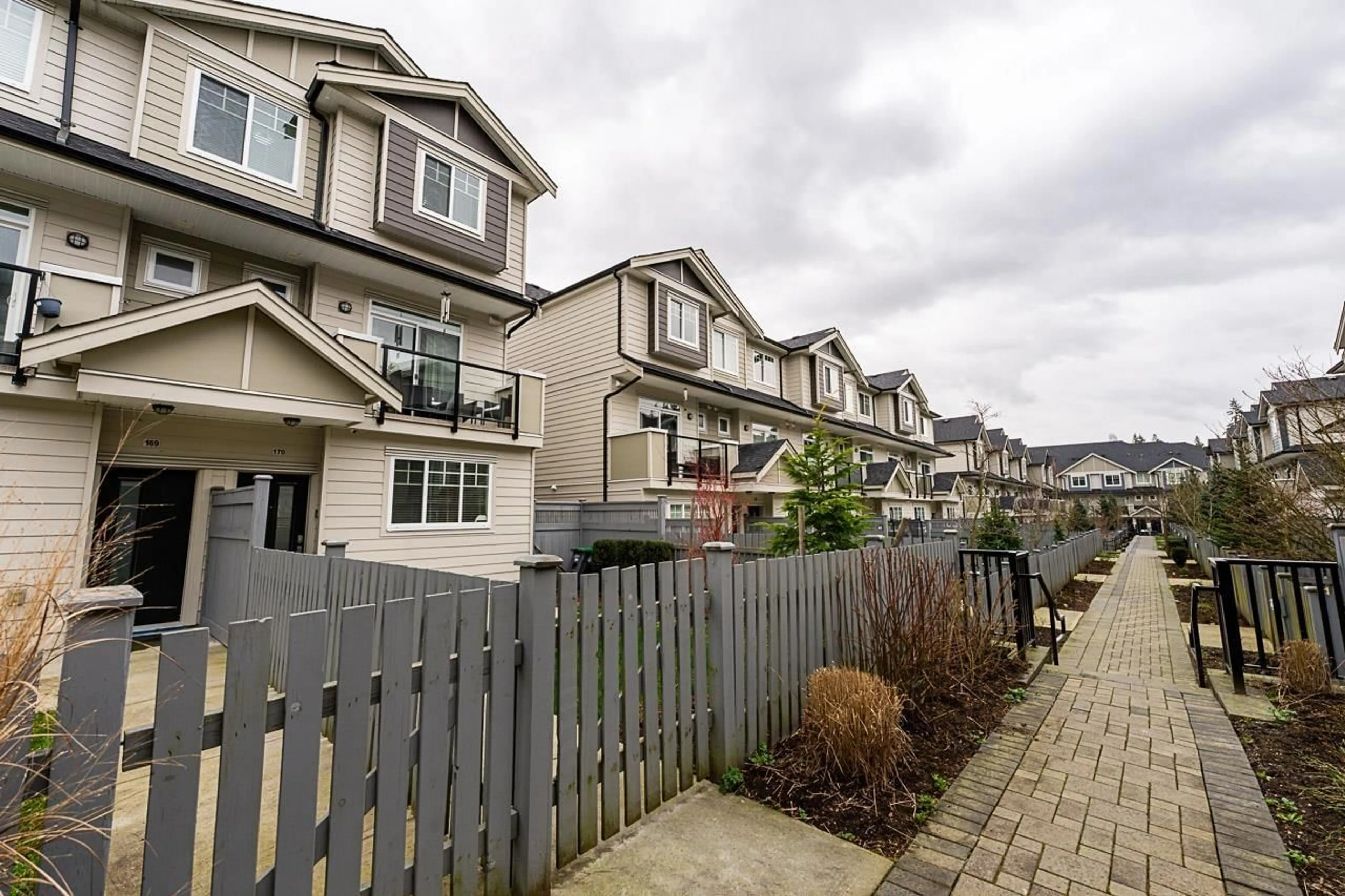 A pic from outside/outdoor area/front of a property/back of a property/a pic from drone, street for 170 - 13898 64, Surrey British Columbia V3W1L6