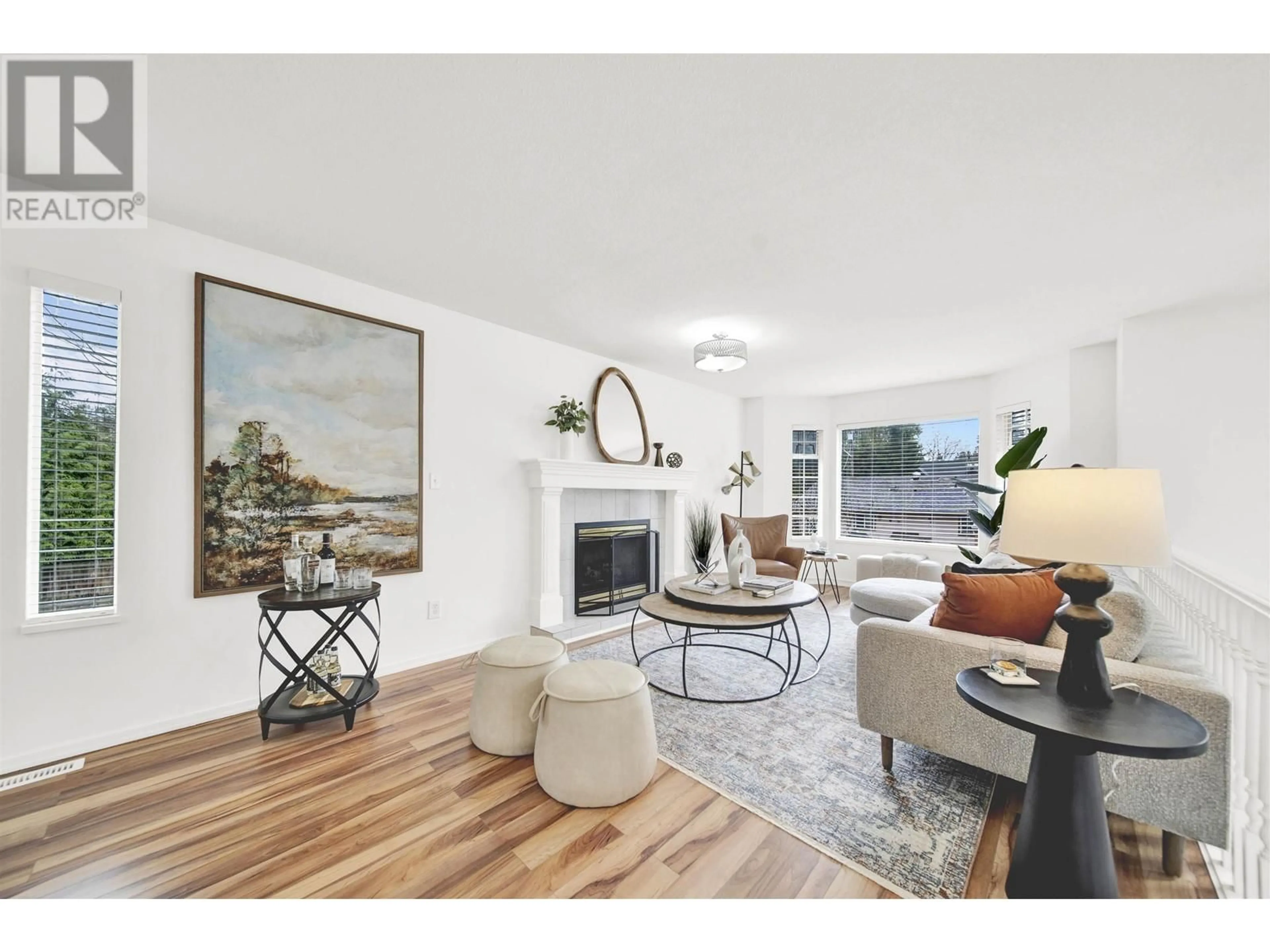 Living room with furniture, wood/laminate floor for 21209 DEWDNEY TRUNK ROAD, Maple Ridge British Columbia V4N4V5