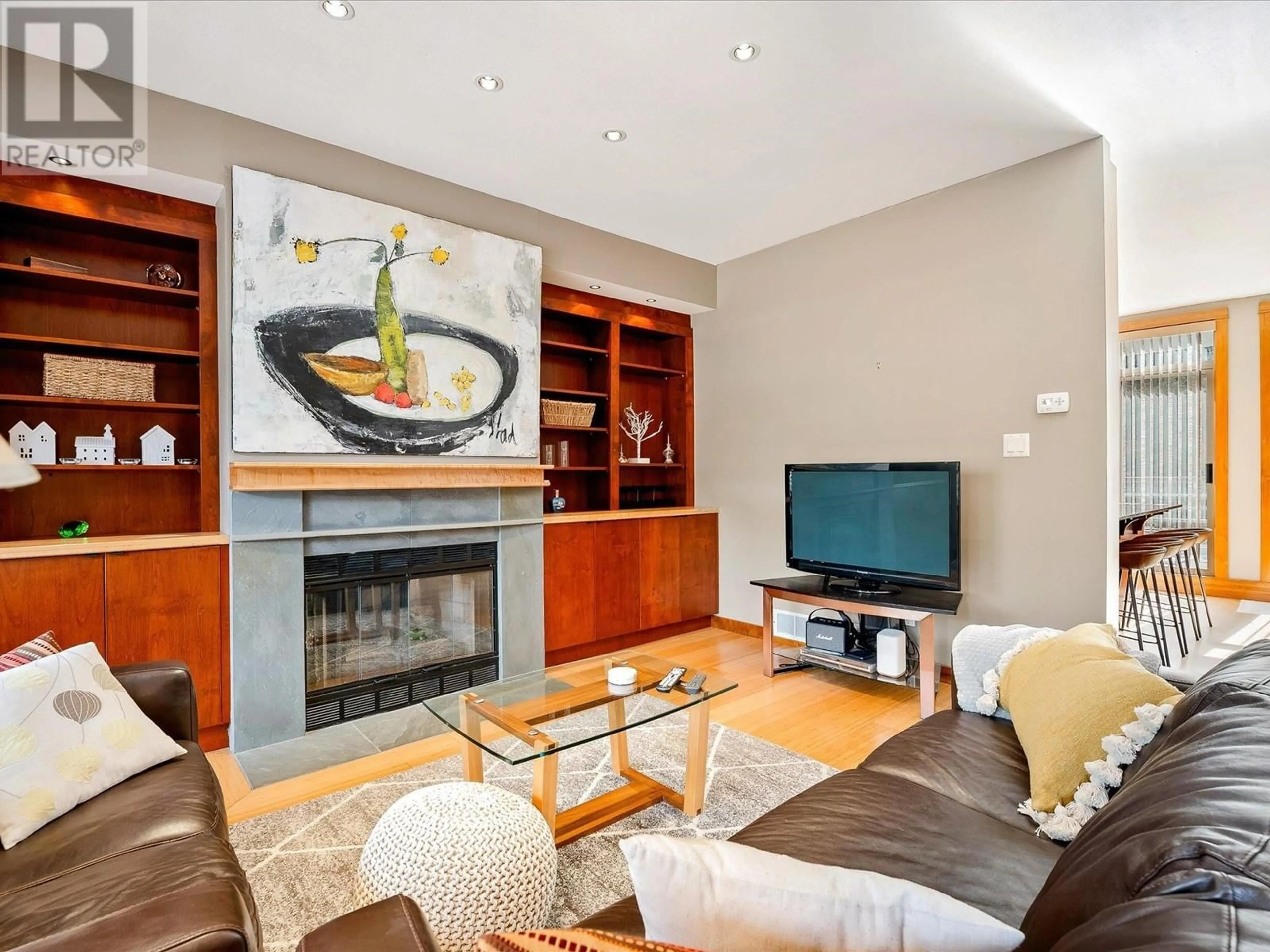 Living room with furniture, wood/laminate floor for 10 - 8030 NICKLAUS NORTH BOULEVARD, Whistler British Columbia V8E1J7