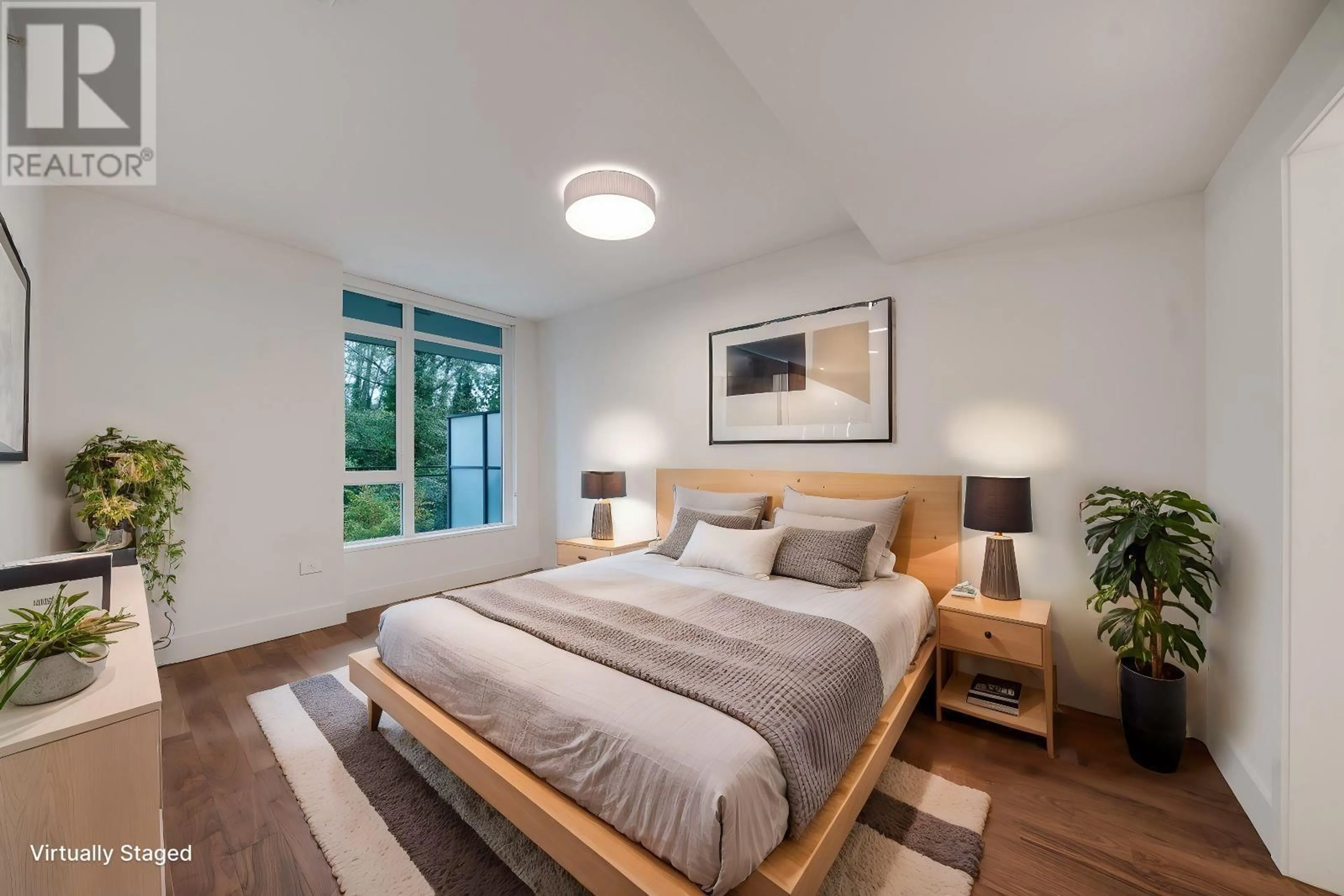 Bedroom with bed, wood/laminate floor for 304 - 7428 ALBERTA STREET, Vancouver British Columbia V5X0J5