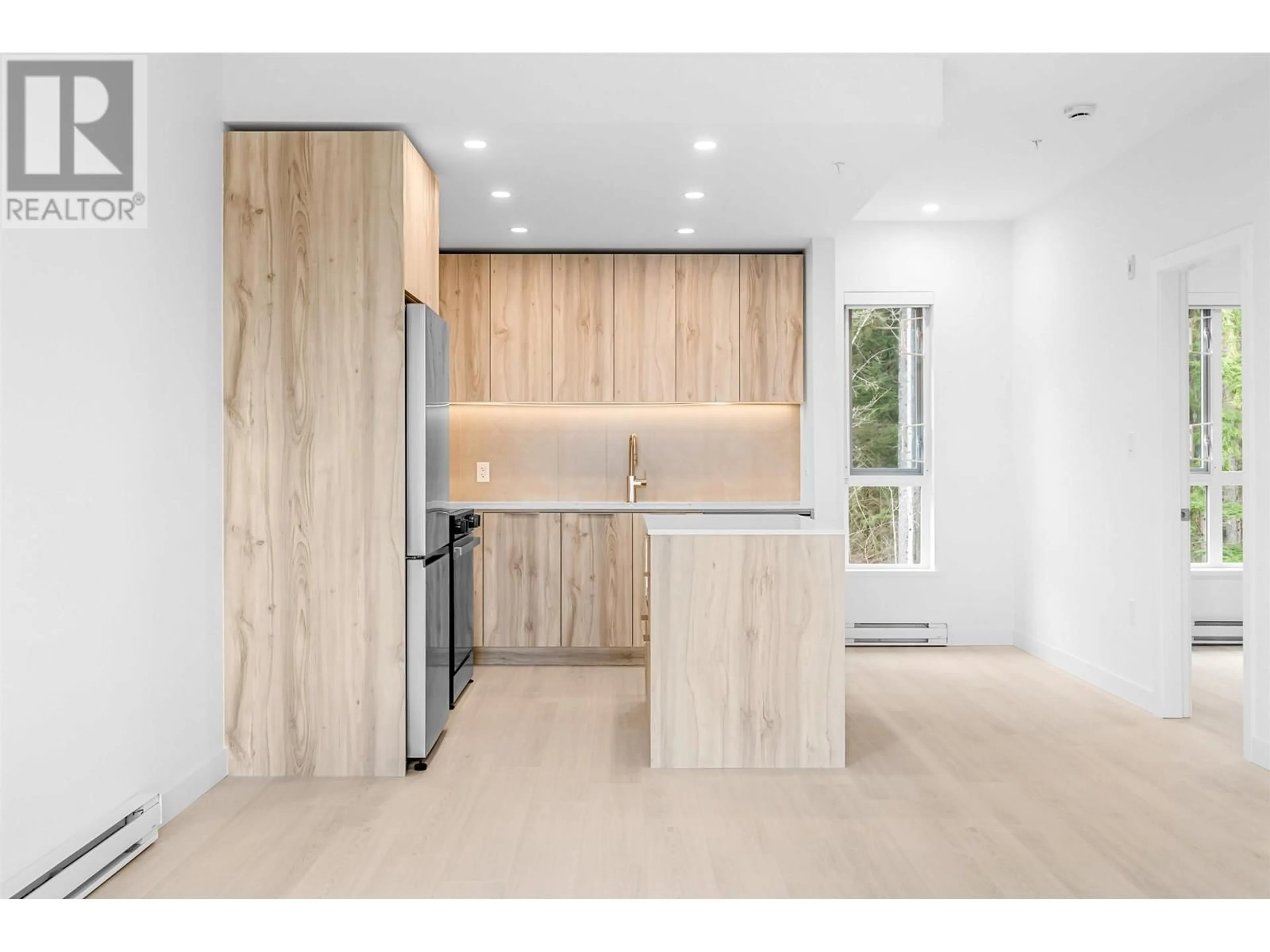Open concept kitchen, unknown for 408 - 3596 MALSUM DRIVE, North Vancouver British Columbia V7G0B2