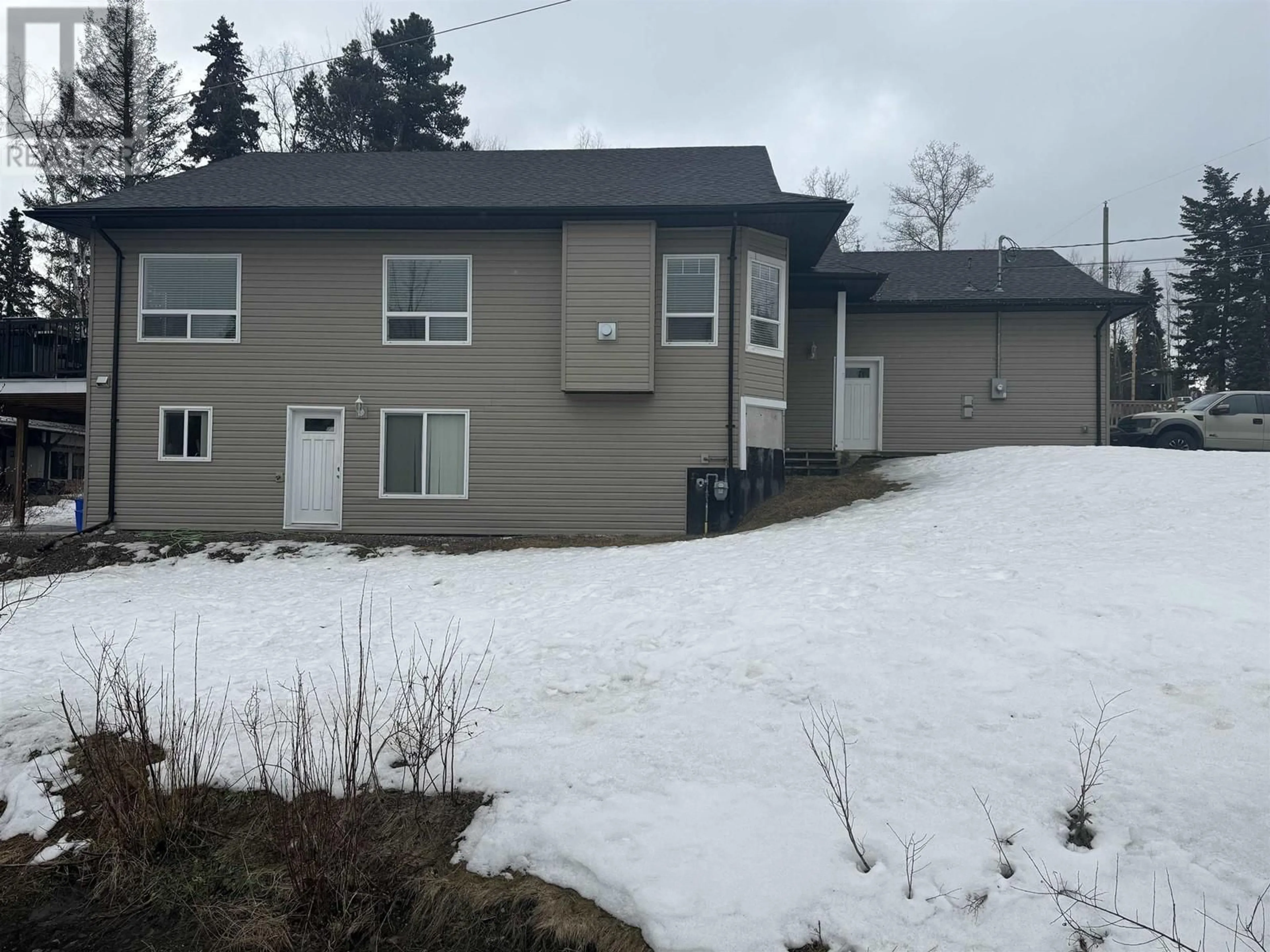 A pic from outside/outdoor area/front of a property/back of a property/a pic from drone, street for 7102 ELK ROAD, Prince George British Columbia V2N5P6