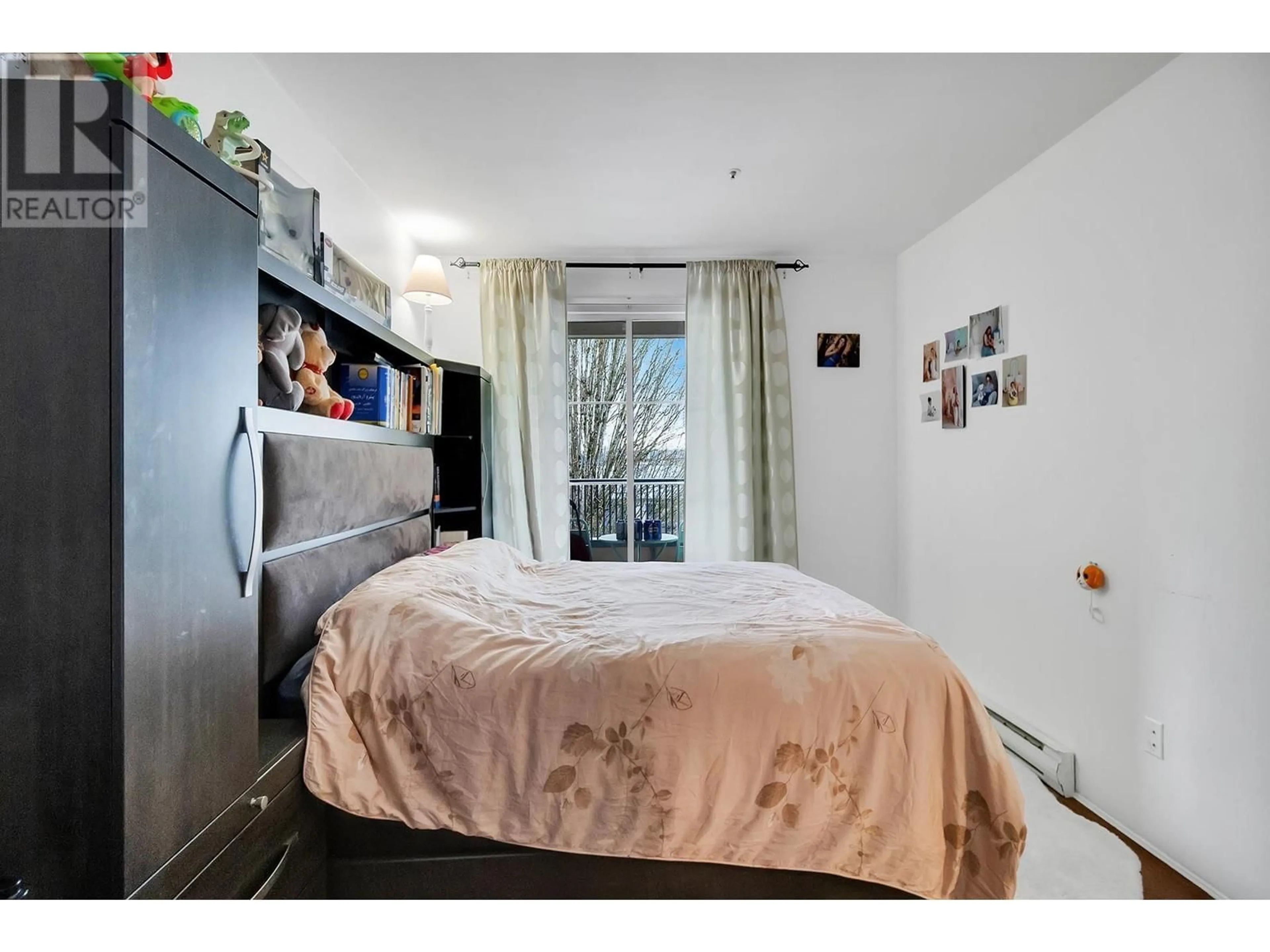 Bedroom with bed, wood/laminate floor for 206 - 295 SCHOOLHOUSE STREET, Coquitlam British Columbia V3K6X5