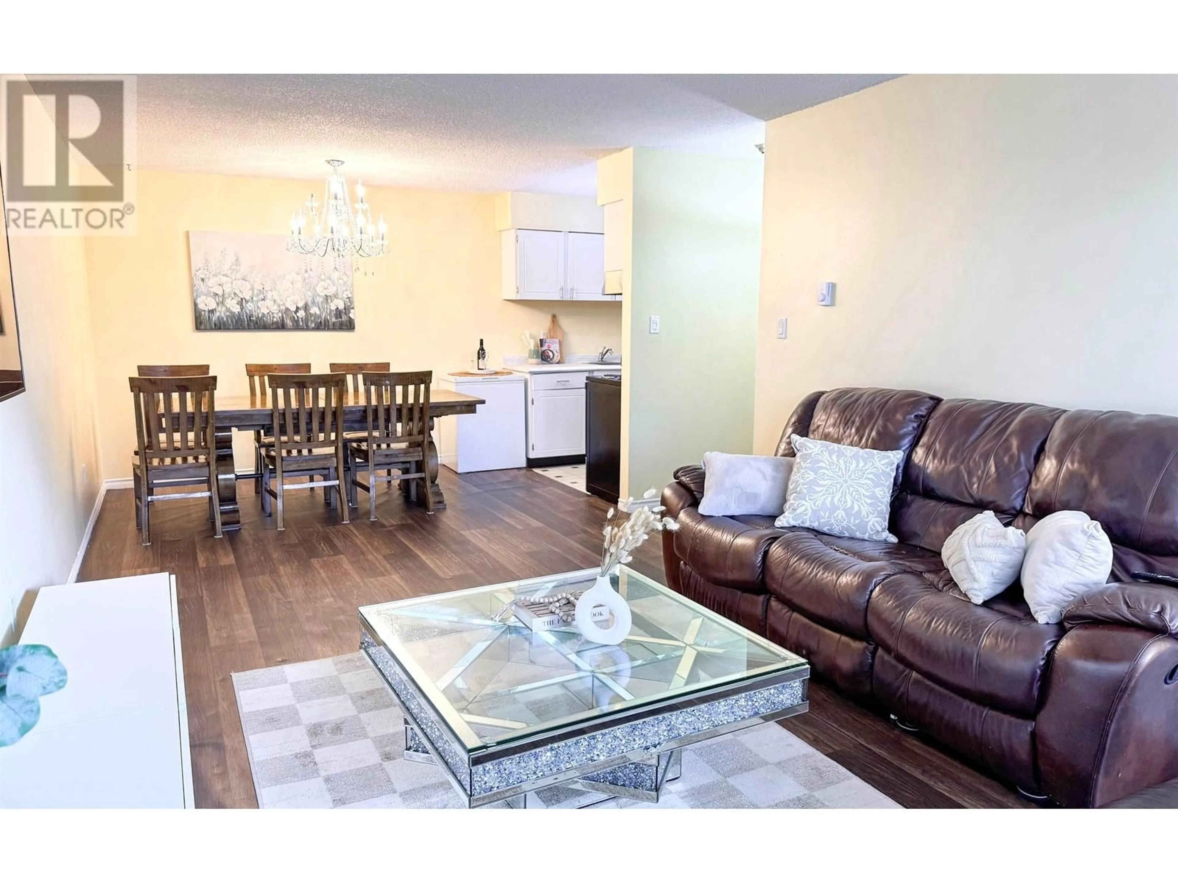 Living room with furniture, wood/laminate floor for 209 - 6655 LYNAS LANE, Richmond British Columbia V7C3K8